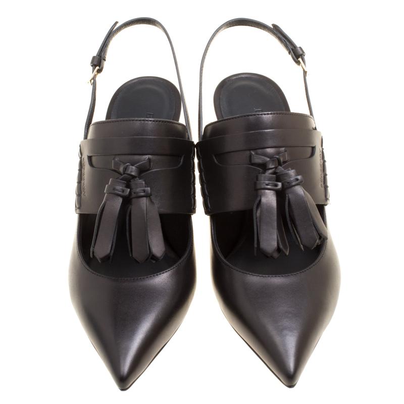 This pair from Burberry definitely deserves your love as it is well-built and exquisite in appeal. They've been crafted from black leather and styled with covered pointed toes, cutouts, tassels, buckle slingbacks, and 6.5 cm heels. The sandals are