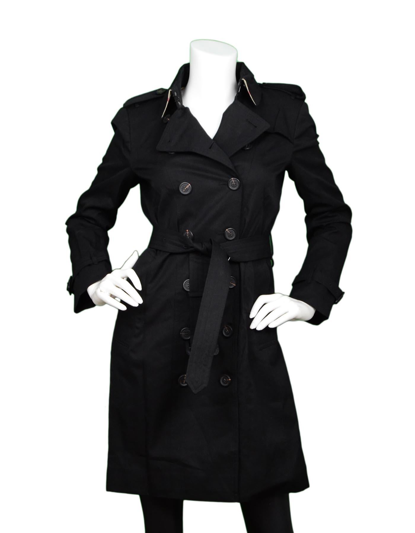 Burberry Black Double Breasted Sandringham Trench Coat W/ Belt & Garment Bag Sz 6

Made In: London
Color: Black
Materials: 100% cotton
Lining: 100% cotton, tan, black, red, white tartan print
Opening/Closure: Double breasted button
Overall