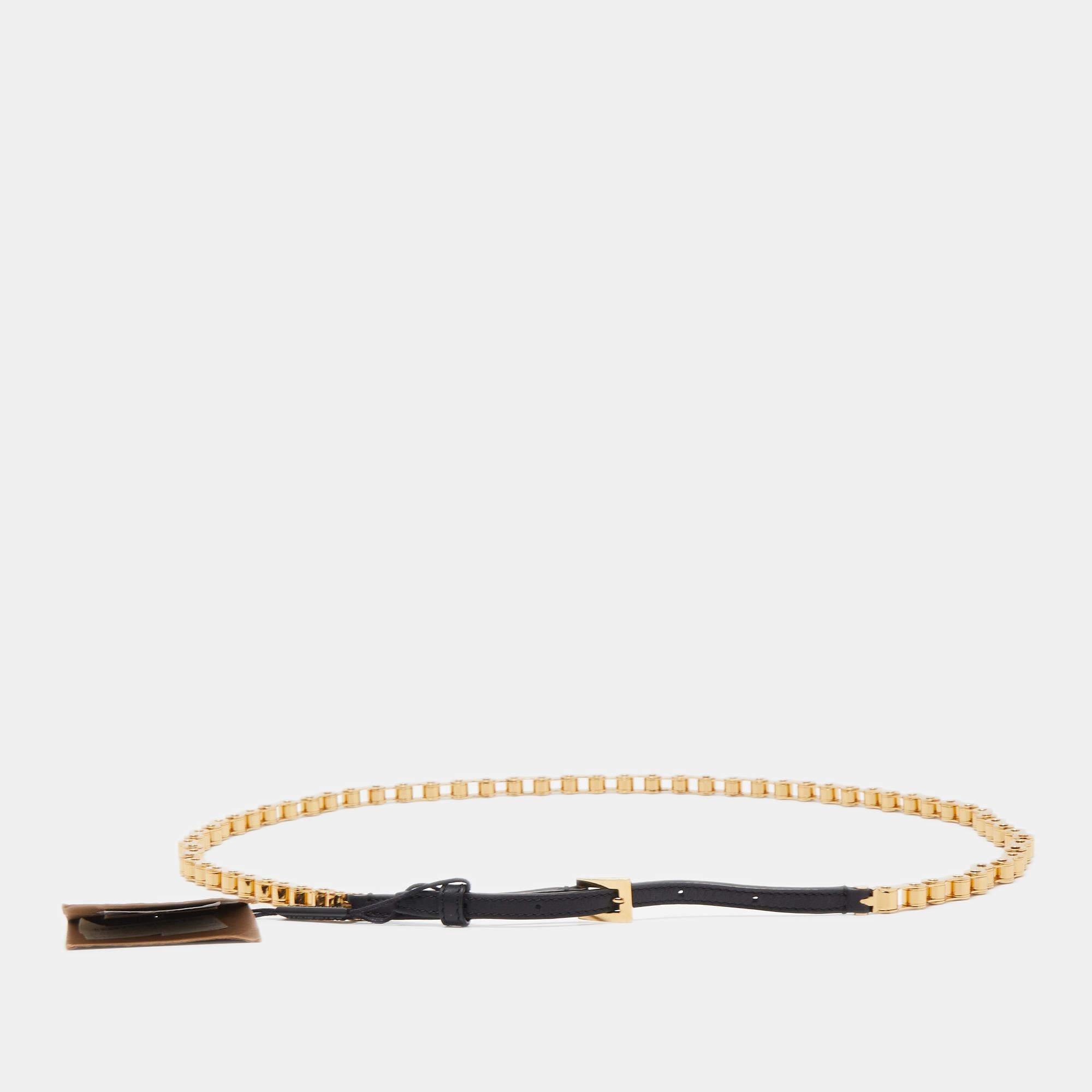 Burberry presents this bracelet for fashionable-thinking women. Made from leather, its bike-chain design is complemented with gold-plated metal.

Includes: Original Dustbag, Price Tag

