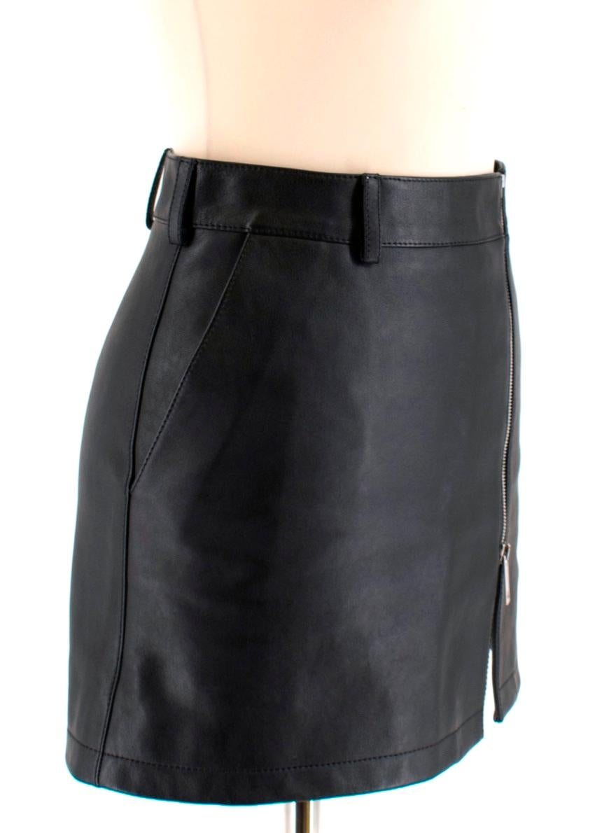 Burberry Black High Leather Waist Mini Skirt

- Zip down detailing
- Belt loops
- Pockets details
- Fully lined

100% Calf grain leather

Specialist leather clean only

Made in Italy 

Please note, these items are pre-owned and may show signs of