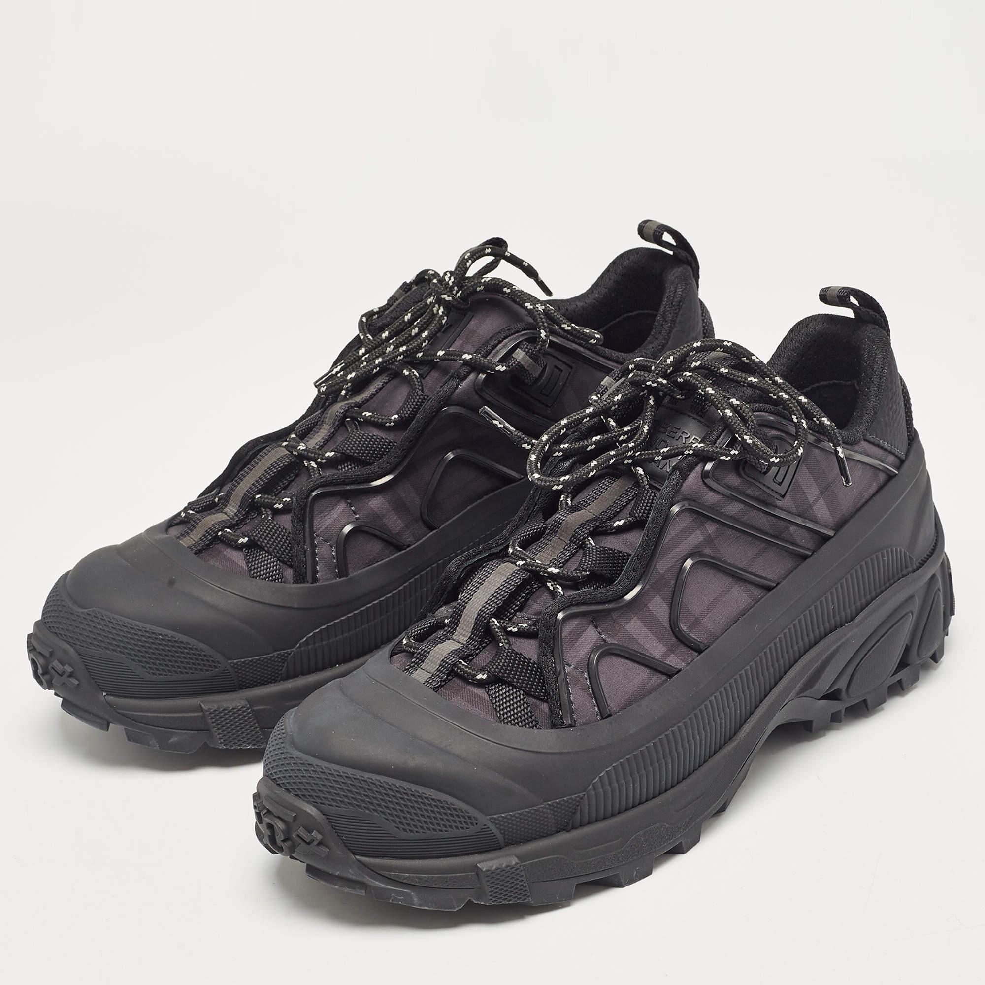 Elevate your footwear game with these Burberry sneakers. Combining high end aesthetics and unmatched comfort these sneakers are a symbol of modern luxury and impeccable taste.