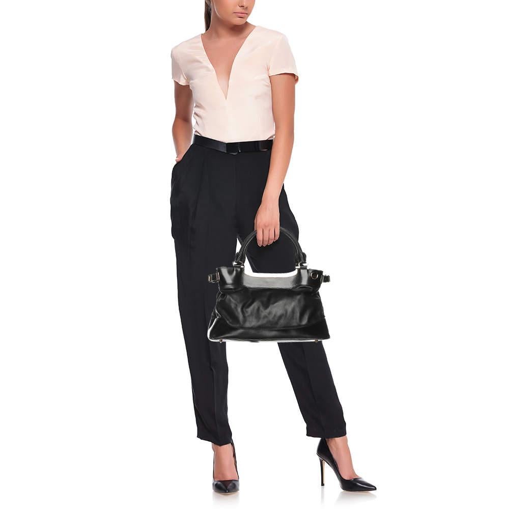 This Burberry black tote for women is super classy and functional  perfect for everyday use. We like the simple details and its high quality finish.