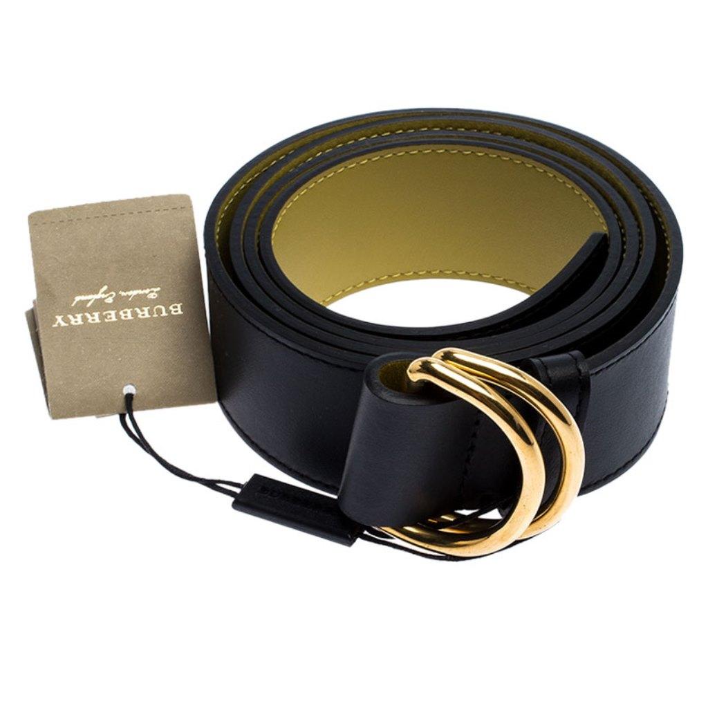 A staple accessory, add this Burberry belt to your classic collection today. This durable belt is crafted from black and green leather and is completed with a slender gold-tone buckle engraved with the brand name.

Includes: Original Dustbag, Price