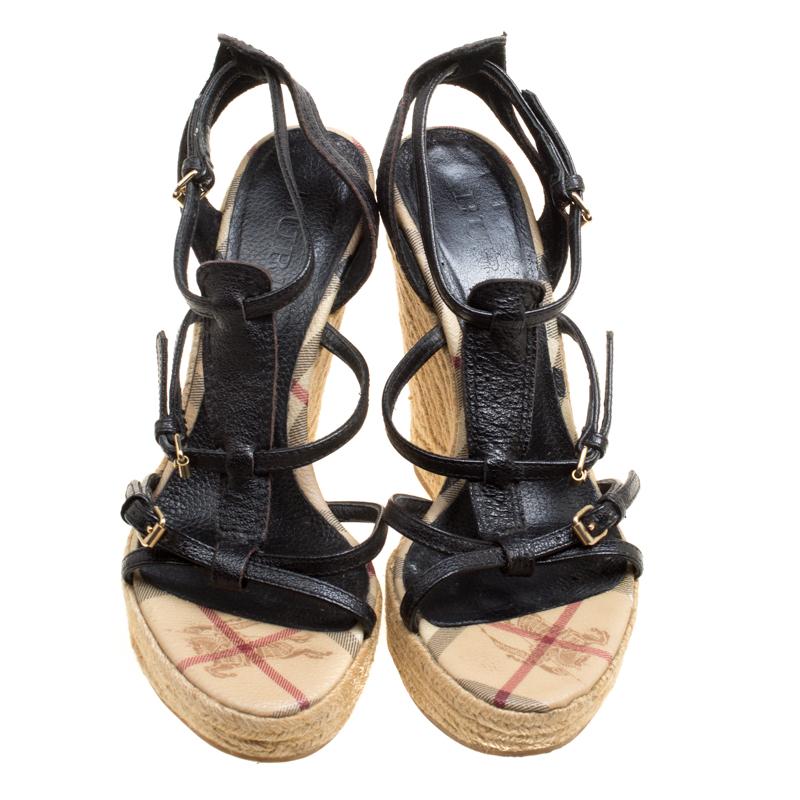 We can't stop gushing over this amazing pair of sandals from Burberry. They have been crafted from leather and styled in a strappy layout. The sandals come with buckle ankle straps and espadrille wedges.

Includes: The Luxury Closet Packaging

The