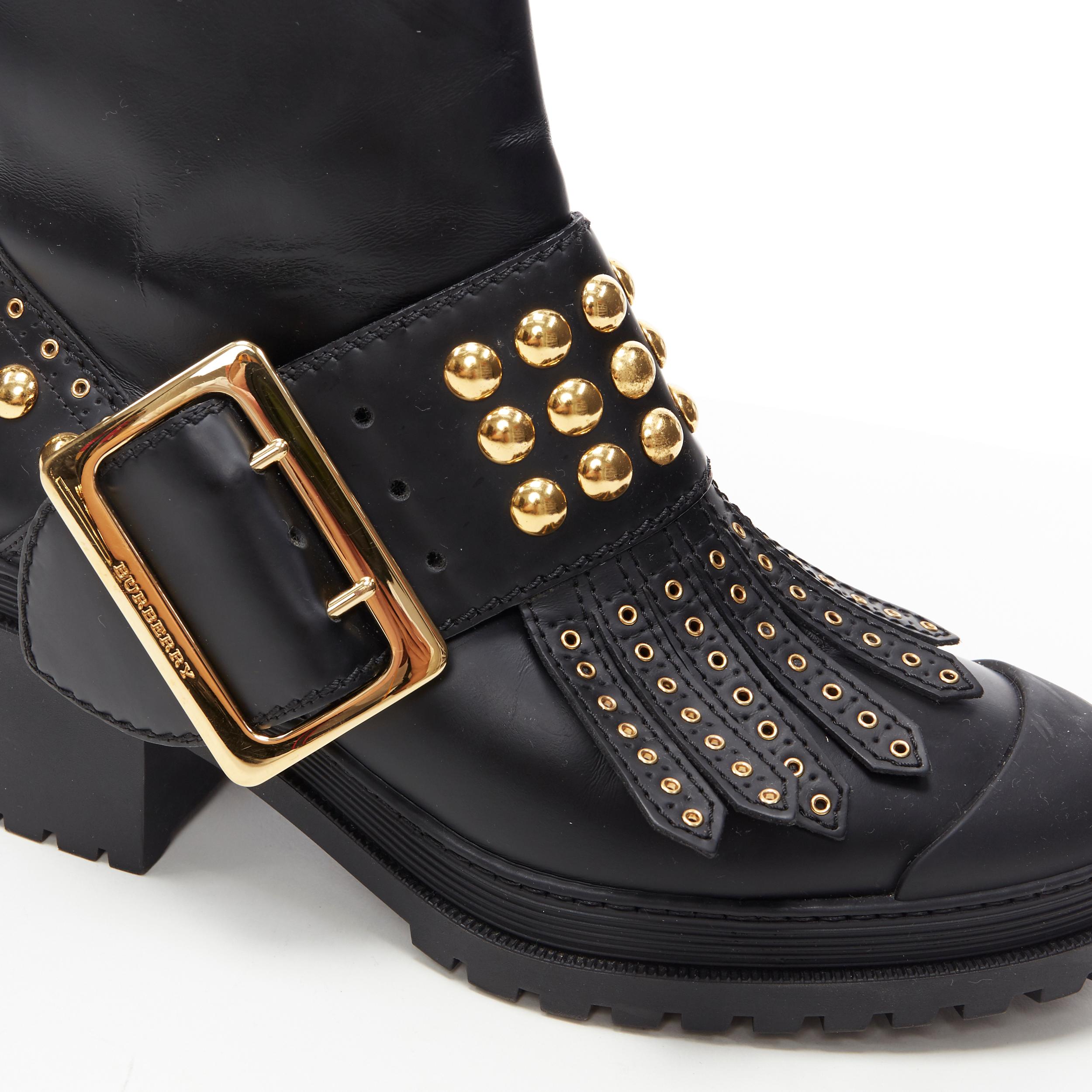 BURBERRY black leather gold studded fringe large buckle trucker ankle boot  EU40 at 1stDibs