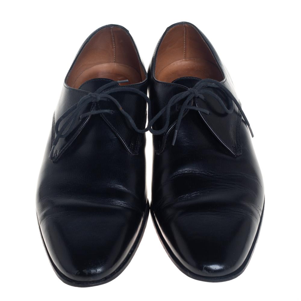 These Burberry Millstead oxfords will add a sharp touch to any formal outfit. Made from black leather, these lace-up oxfords feature round toes and a clean, polished finish. They are leather-lined and come with tough outsoles.

