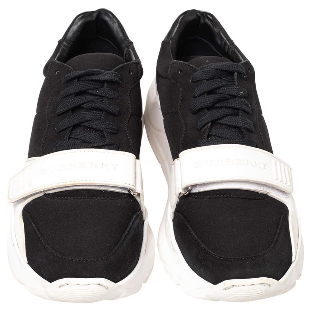 A sporty low-top silhouette in leather, neoprene and suede. Designed by Burberry, the Ramsey sneakers have lace-up closure and a velcro strap on the uppers. The design is mounted on chunky rubber soles.

