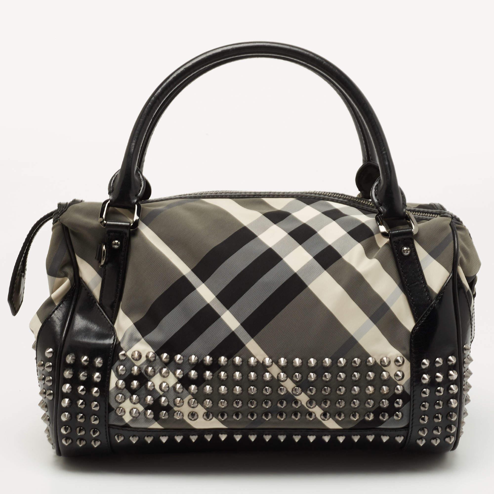 Handbags are more than just instruments to carry one's essentials. They tell a woman's sense of style, and the better the bag, the more confidence she gets when she holds it. This designer bag is meticulously made from luxe materials and has a