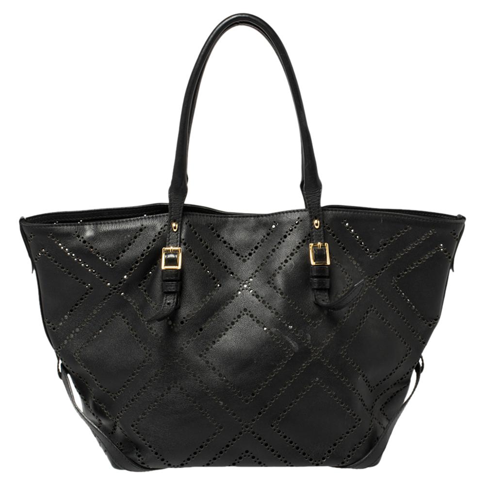 Stylish and brilliantly designed, you cannot go wrong with this Salisbury tote from Burberry. It has been crafted from perforated leather featuring dual top handles and a leather-lined interior. This black tote is complete with a gold-tone plaque on