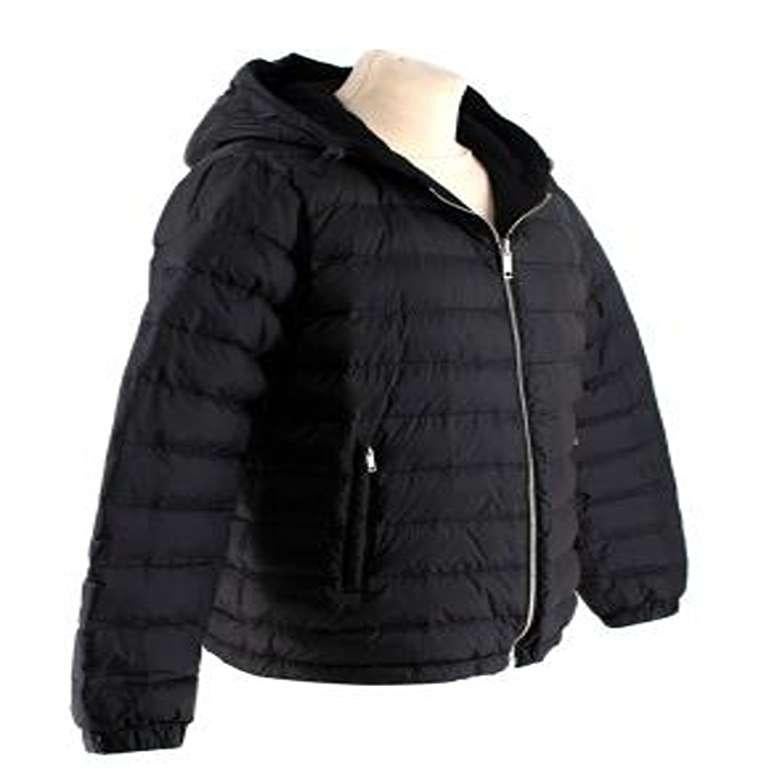 Black Quilted Down Hooded Jacket

- Goose down padded, and part lined in cashmere-blend
- Silver-tone zip closure and two front pockets
- Drawstring to the hem and hood 
- Elasticated cuffs

9.5
Excellent condition

Materials:
100% Polyester
Lining