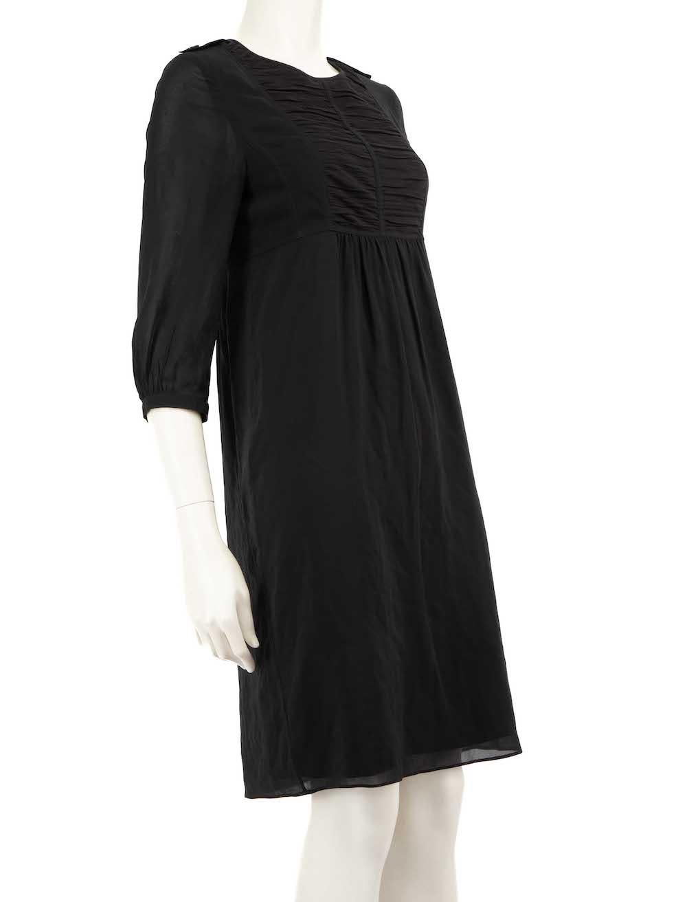 CONDITION is Very good. Hardly any visible wear to the dress is evident on this used Burberry designer resale item.
 
 
 
 Details
 
 
 Black
 
 Silk
 
 Knee length dress
 
 Round neckline
 
 Ruched detail
 
 Sheer mid length sleeves
 
 Buttoned