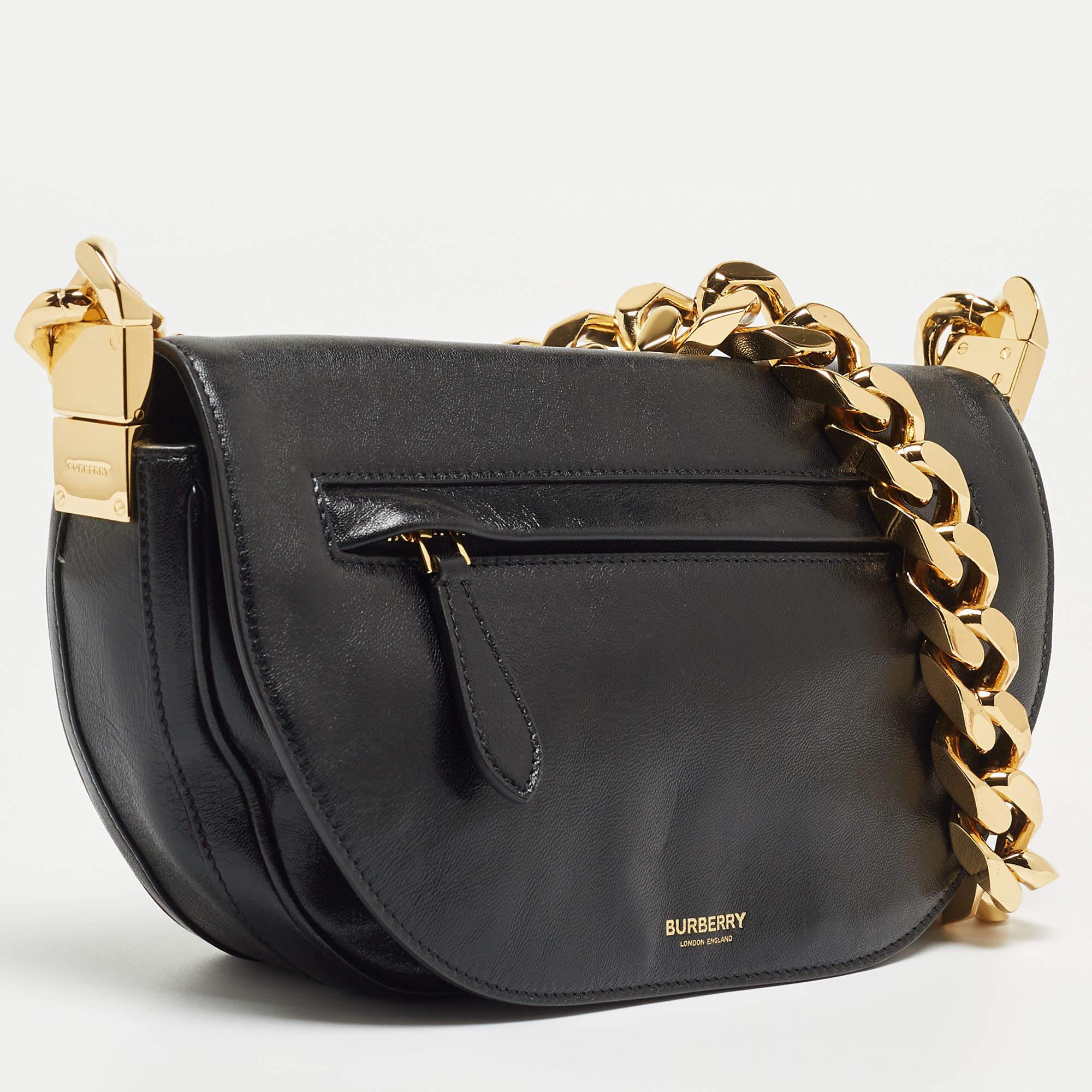 With an architectural shape, this Burberry Olympia bag resembles the crescent moon. The brand signature on the front lends to its instant identification, and it can be carried conveniently with a shoulder strap. Capturing the essence of feminity, it