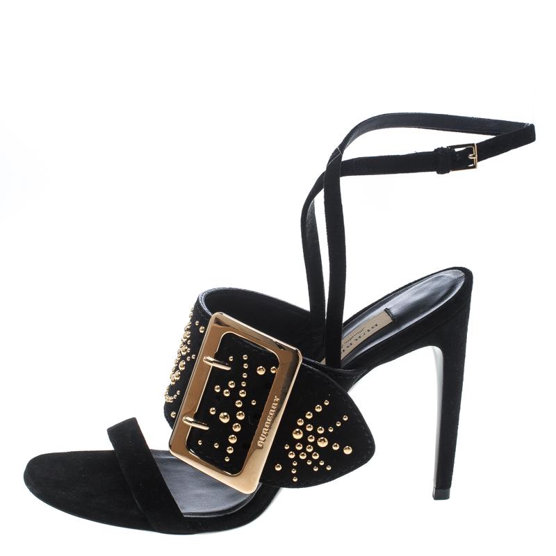 Gorgeous sandals are a closet essential, and there's no reason why yours must be left behind. No better start than with these from Burberry! Carrying open toes, studded buckle straps and 10.5 cm heels, these black suede sandals are beautiful.