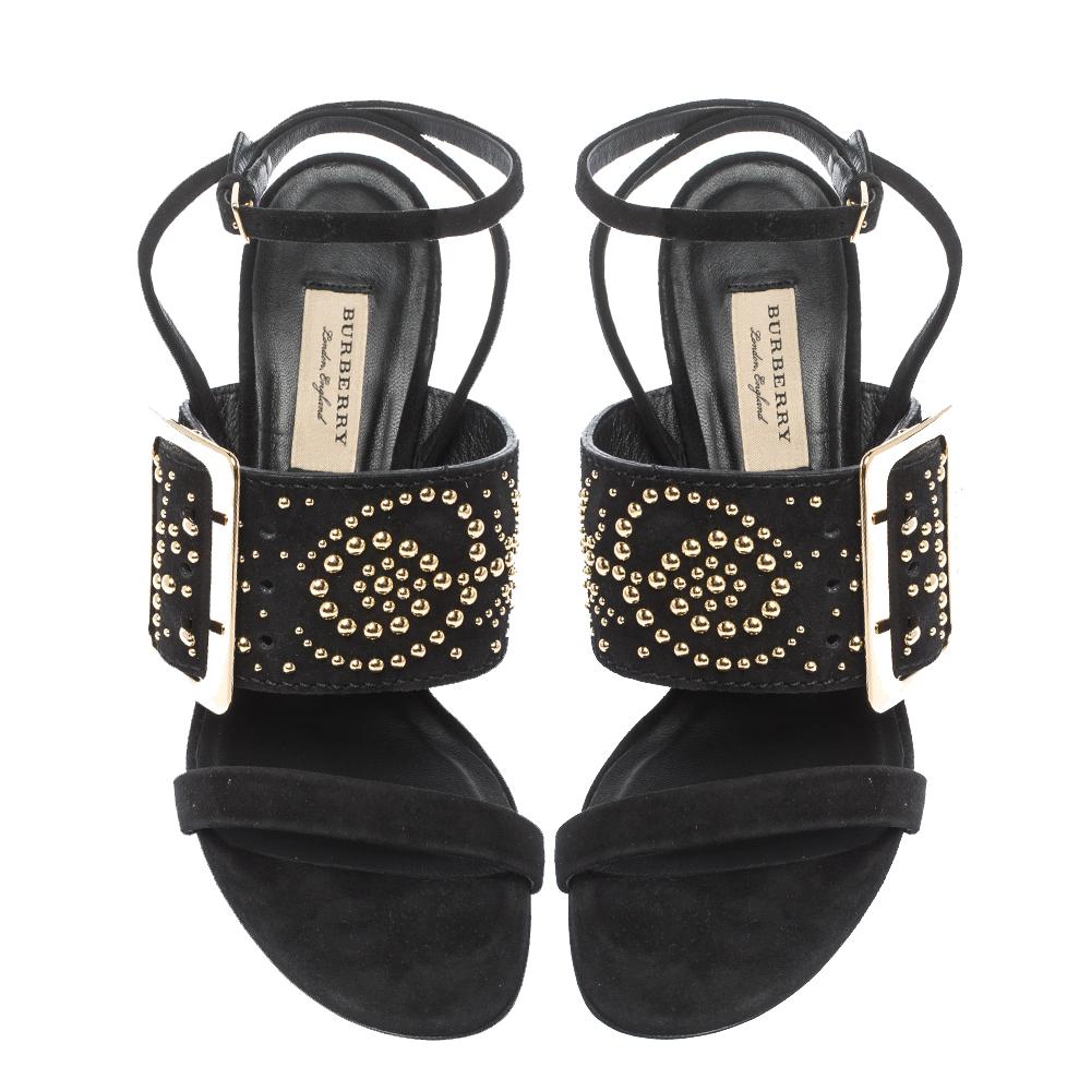 You'll find excuses to wear these gorgeous black sandals from Burberry as they are all about high style! These sandals feature suede straps, large embellished straps with buckle detailing, ankle fastening and open toes. They are set on leather