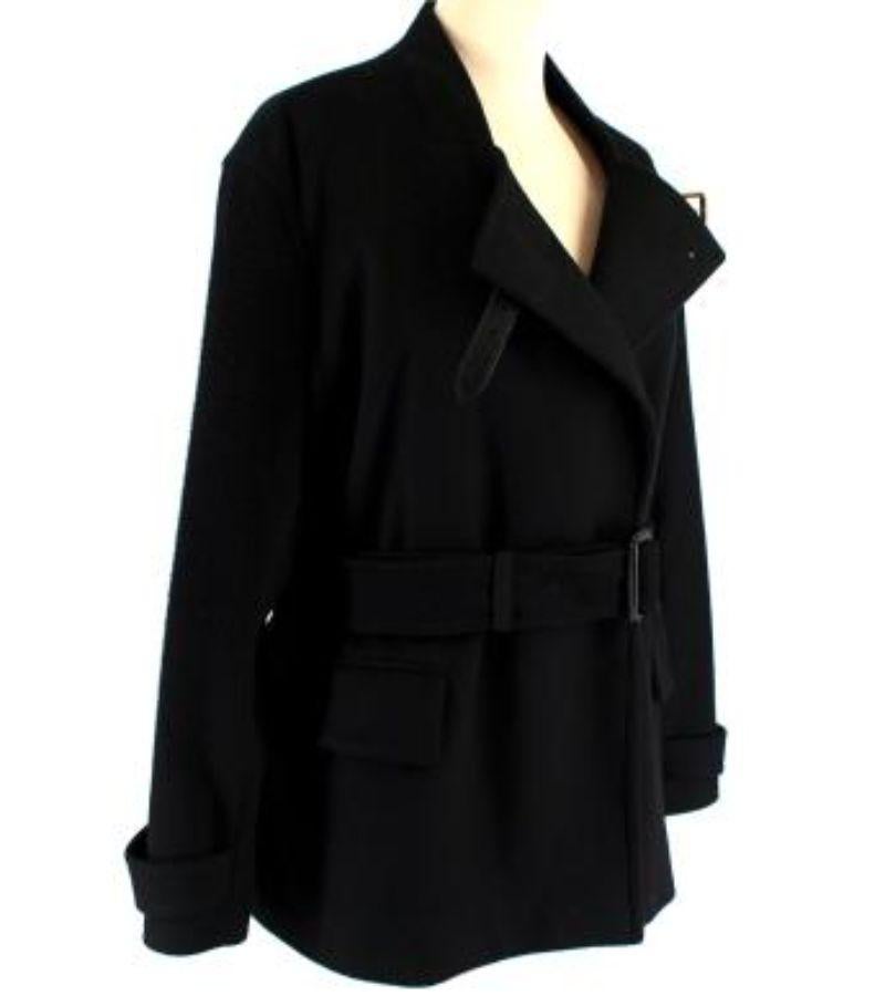 Burberry Black Wool & Cashmere Short Trench Coat with Leather Straps

- One-button fastening at neck
- Adjustable belt fastening
- Leather strap detailing
- High neck
- Two front flap pockets
- Fully lined
- Adjustable buttoned cuffs
- Rear