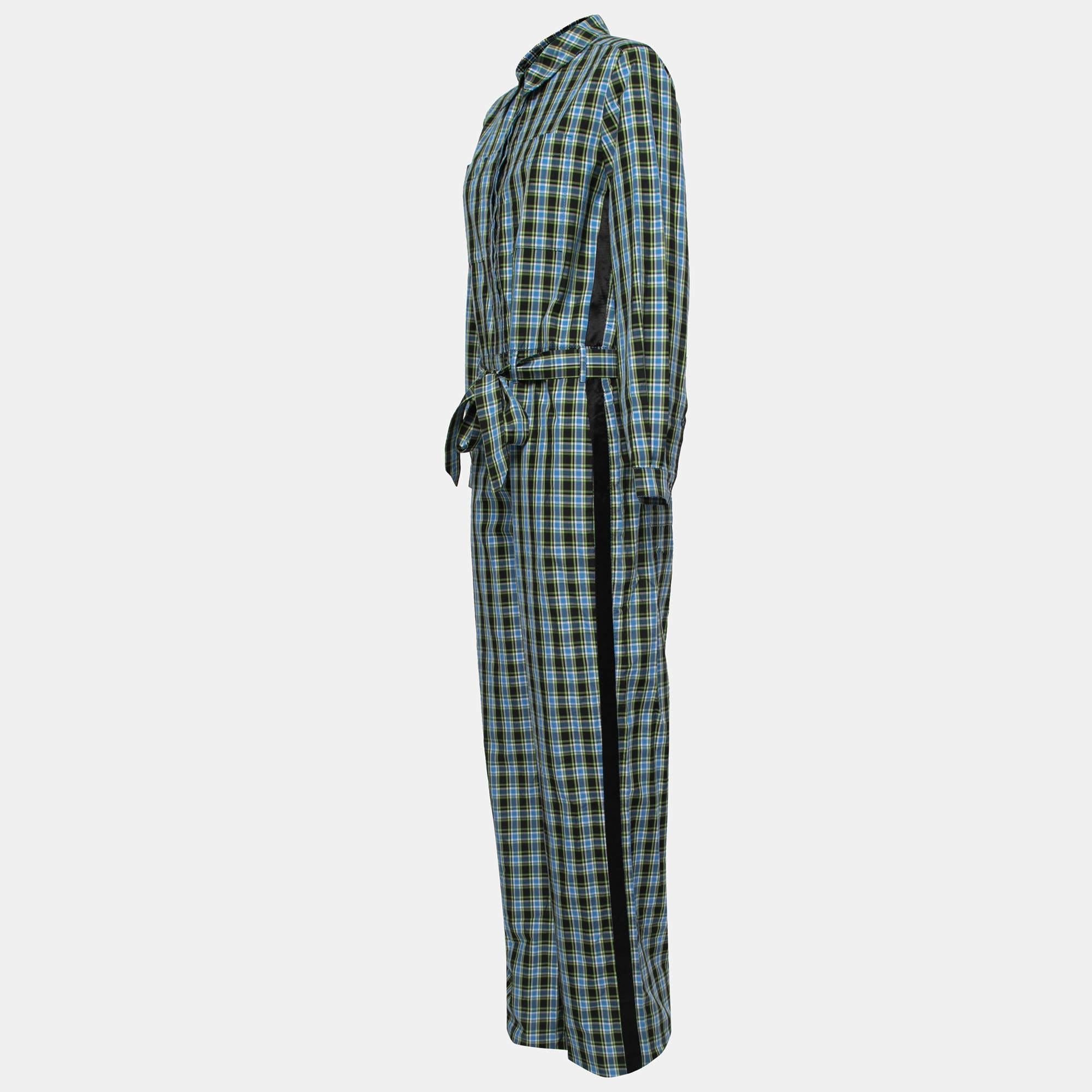 Giving off those comfy vibes is this Burberry jumpsuit, perfect for relaxed days. It is made from cotton and displays a stylish plaid checked pattern with a belt detail. Pair it with flats and hoop earrings for that chic look.

Includes: Price Tag,