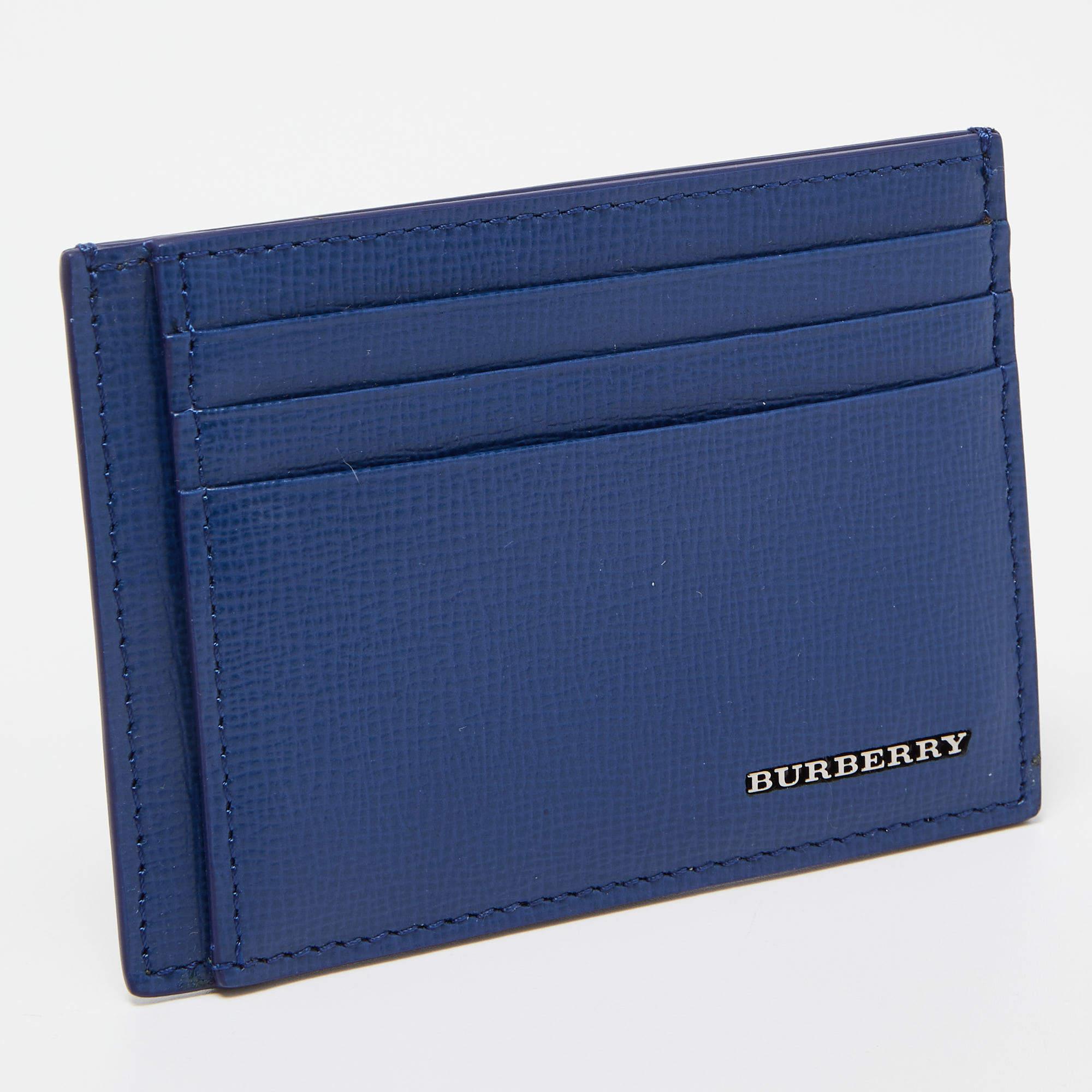 This stylish and functional Burberry cardholder is a must-have in your collection. It is equipped with multiple, well-lined slots to hold your cards.

