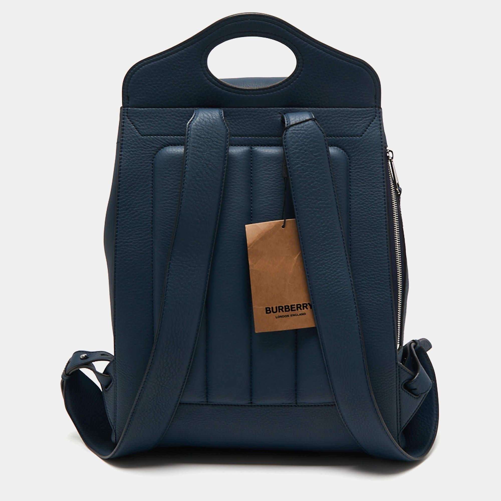 For days of ease and fashion, the House of Burberry has created this classy backpack. It is crafted using blue leather on the exterior. It shows silver-tone hardware and a leather-lined interior. It comes with sturdy shoulder straps for convenience.
