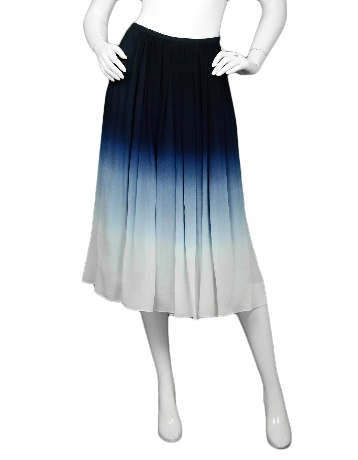 Burberry Blue Ombre Silk-Chiffon Midi Skirt sz IT38

Made In: Italy
Year of Production:  
Color: Blue, White
Materials: 100% Silk
Lining: 100% Silk 
Closure/Opening: Side zipper
Overall Condition: Excellent pre-owned condition
Estimated Retail: