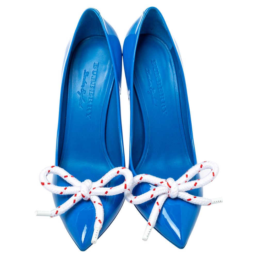 Feel beautiful and be comfortable while flaunting these patent leather pumps. Made by Burberry, this pair of pumps evoke a timeless appeal. The exquisite design of this pair of pumps stands out in a shade of blue.

Includes: Original Box, Price Tag