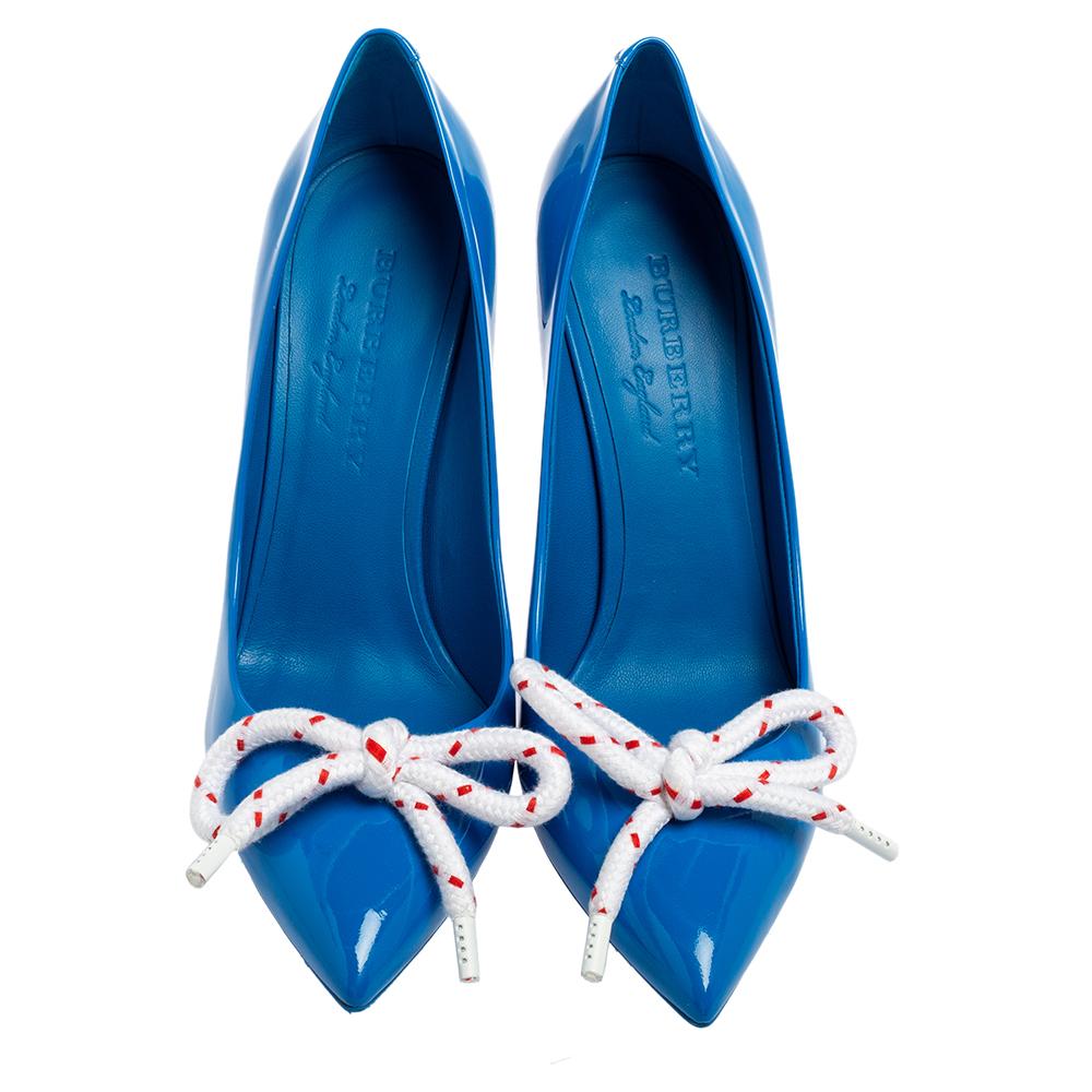 Imagine tieing sporty shoe laces atop a classic feminine silhouette! Burberry did that with the Finsbury pumps and made them look elegant and chic. Crafted from patent leather into a pointed-toe design, they feature laces tied like bows on the