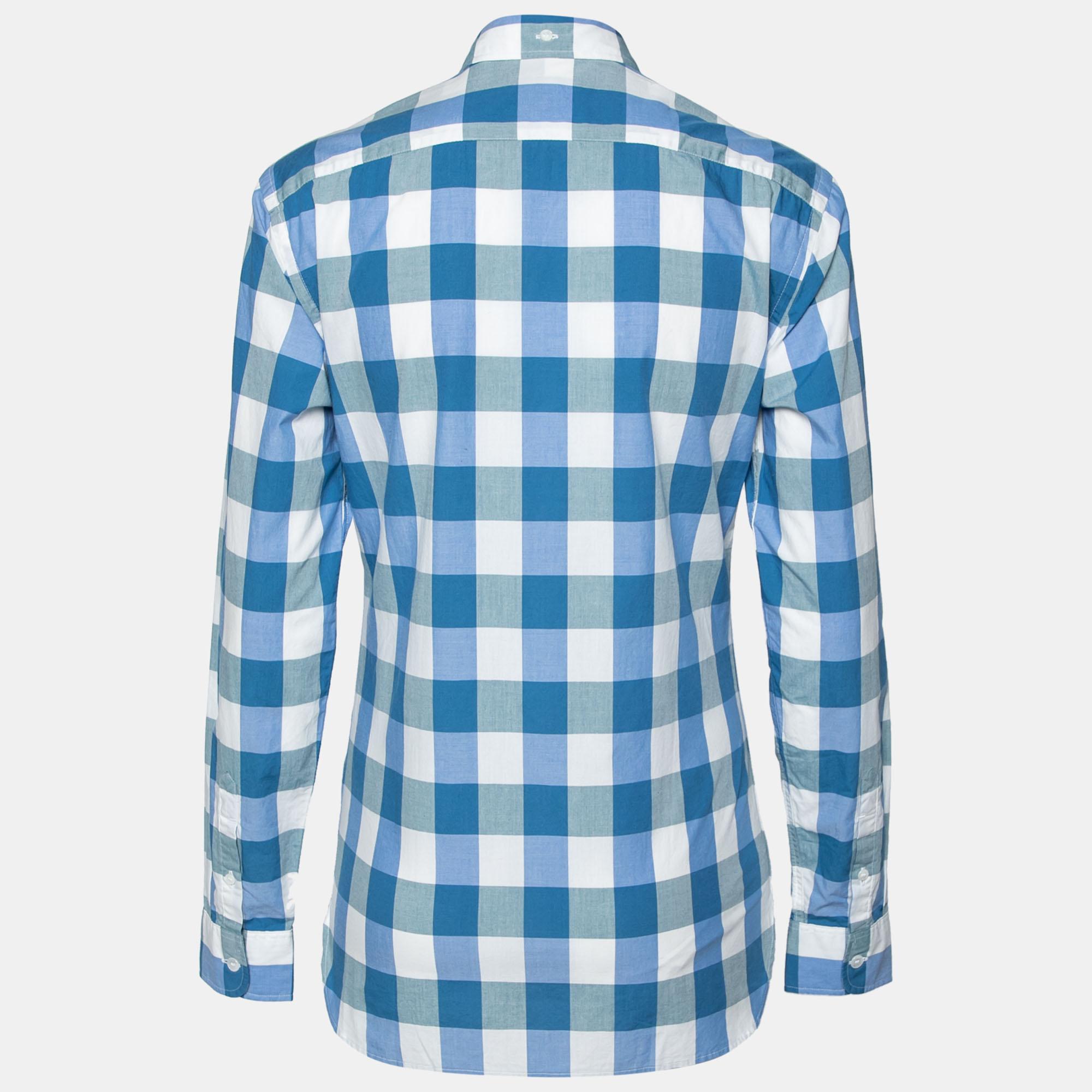 Look your best by adorning this classy Burberry shirt. Made from check-patterned cotton, it is paired with long sleeves with a buttoned cuff, a fine collar, and front button fastening. Wear it with pants or jeans for a sophisticated