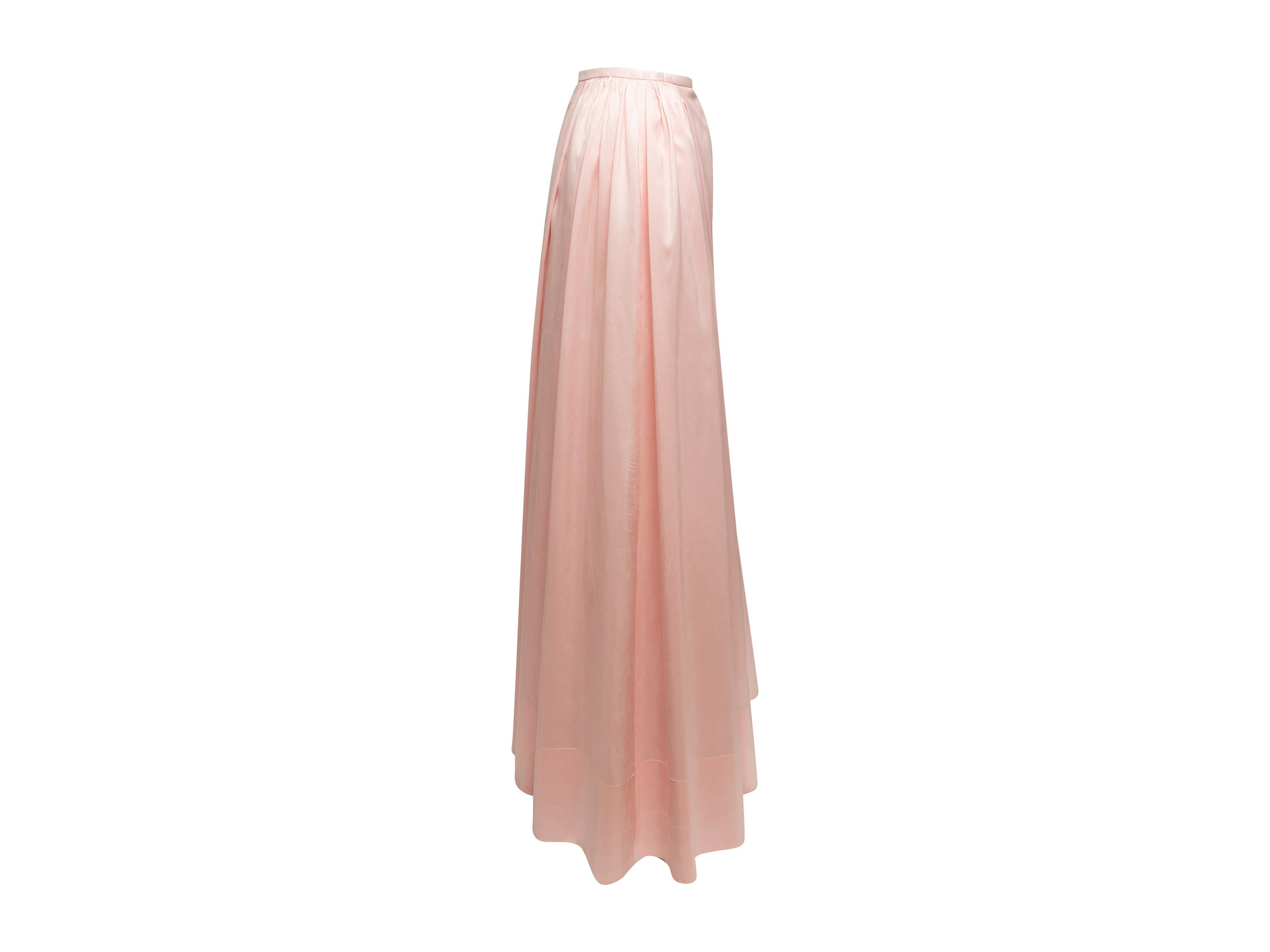 Product details: Blush pink A-line maxi skirt by Burberry. Pleating at hips. Zip closure at side. Designer size 14. 27