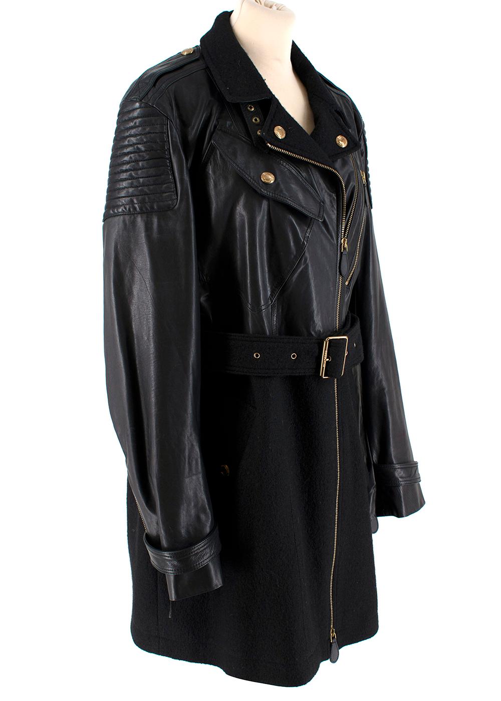 Burberry Brit Black Leather & Wool Blend Moto Coat
-Soft, luxurious leather and wool blend material
-Gold-tone hardware
-Utility-edged details
-Feminine silhouette and waist belt
-Traditional quilted panels 
-Multi zip detail at cuffs & pocket
-One