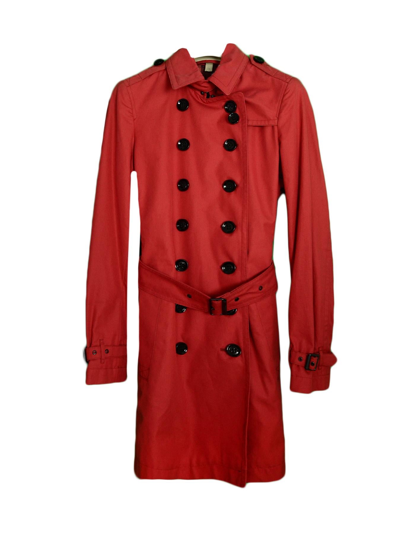 Burberry Brit Burnt Orange Trench Coat w Belt sz 2

Made In: Bosnia
Color: Burnt Orange
Materials: 100% Cotton
Lining: 100% Cotton
Opening/Closure: Front buttons
Overall Condition: Excellent pre-owned condition
Estimated Retail: $995 + tax
Includes: