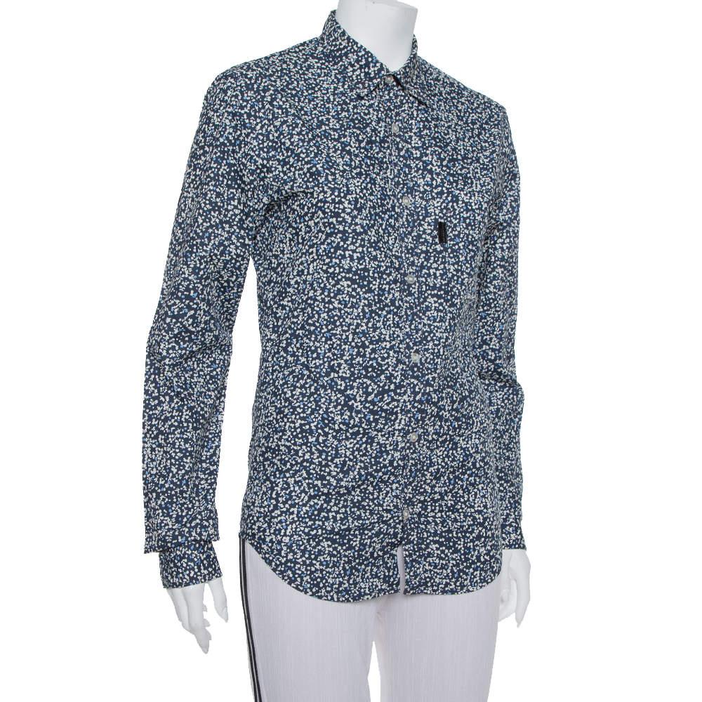 Design and quality come together in this shirt from the house of Burberry Brit. If your style is classic and effortless then this creation is a great choice for you. Covered with prints all over this button front shirt is a must have.