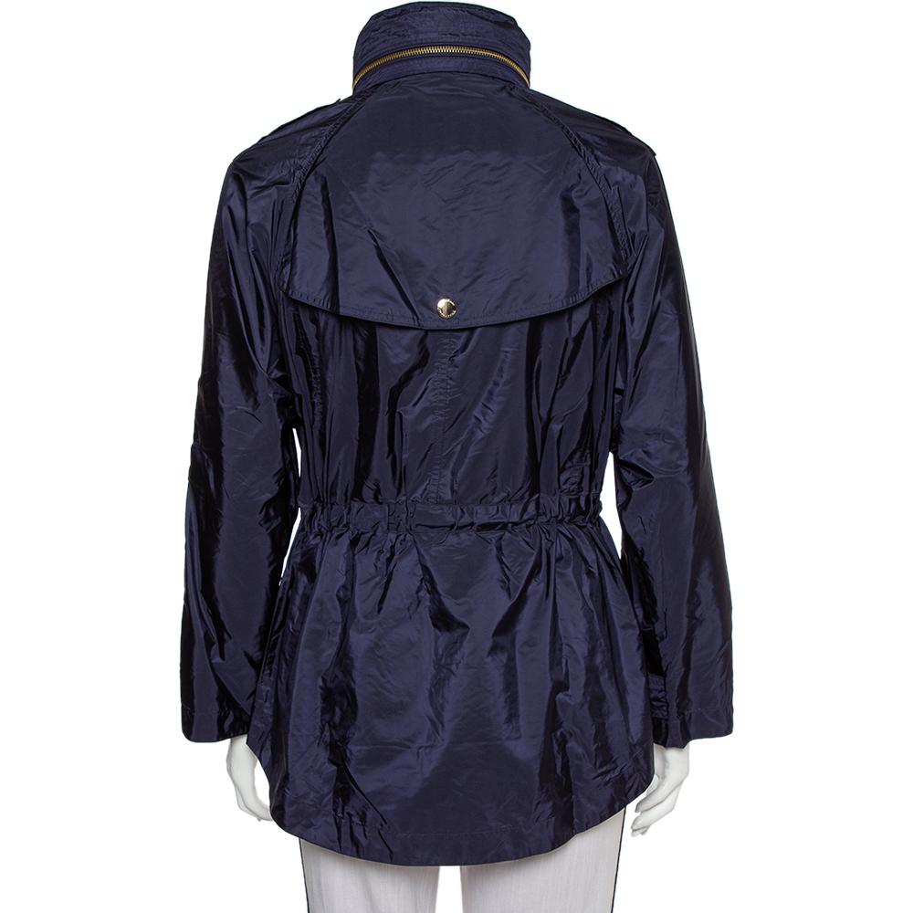 This amazing jacket from Burberry Brit is incredibly chic and effortlessly stylish. The navy blue creation is designed with multiple zip pockets. a high-collared neckline, and long sleeves. It will lend you a fantastic fit and will look great with