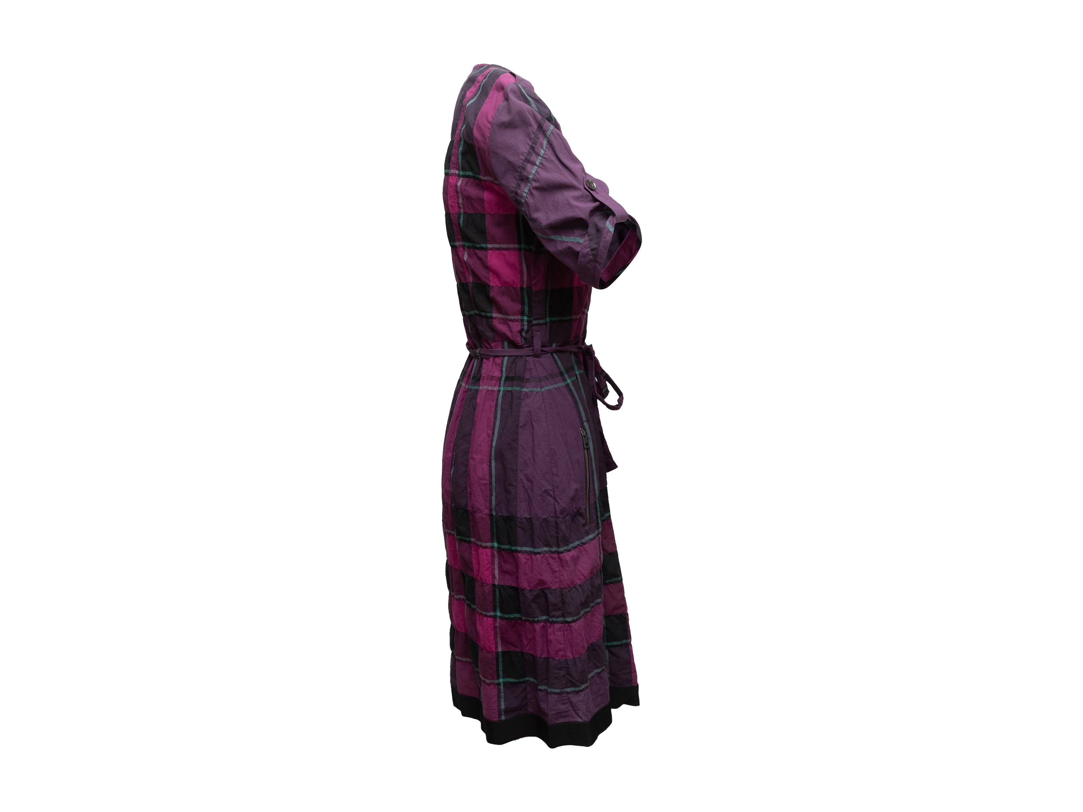 Product details: Purple and multicolor House Check short sleeve dress by Burberry Brit. V-neck. Sash tie at waist. Dual hip pockets. Zip closure at center front. 34
