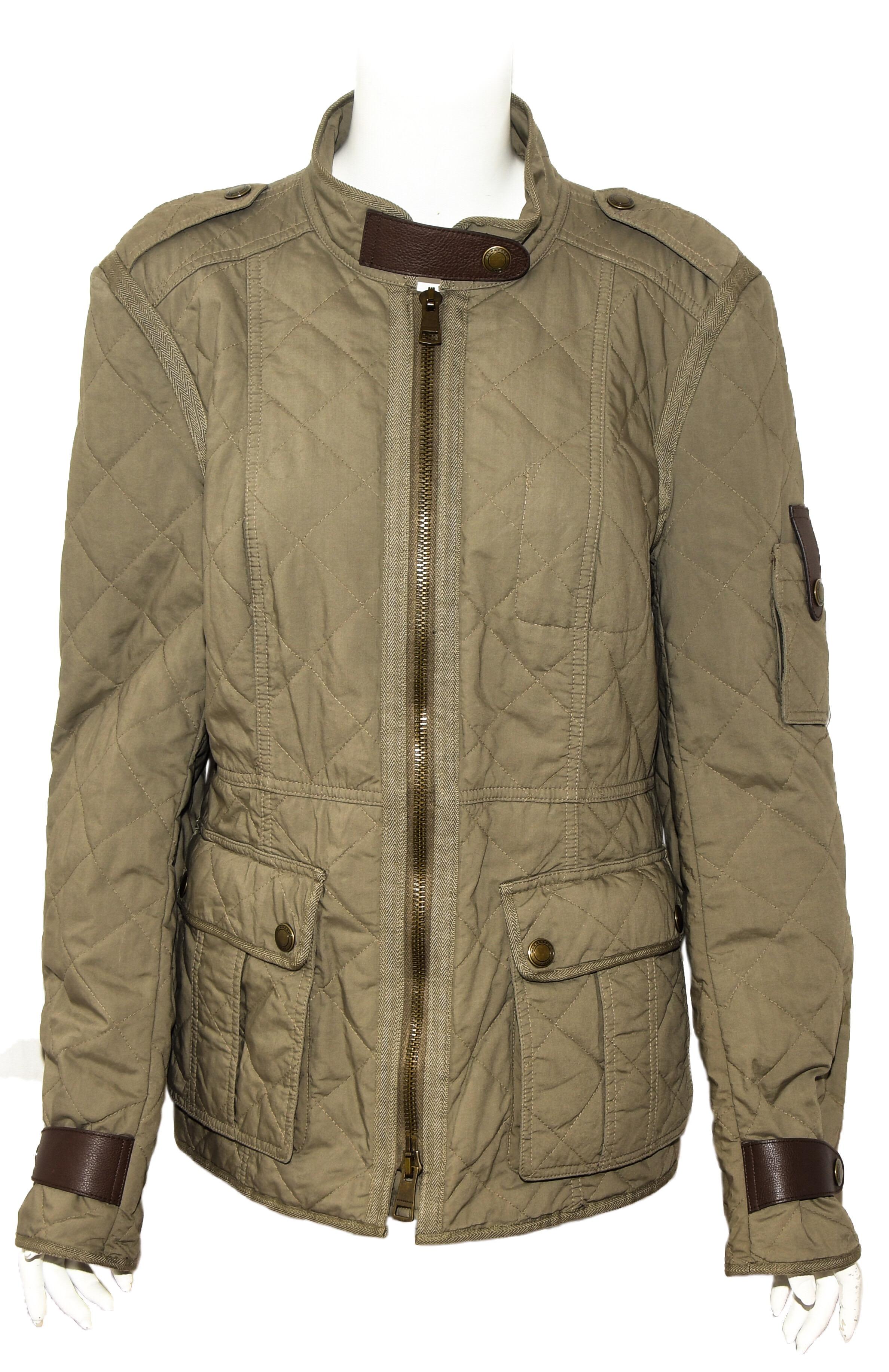 Burberry Brit bayleaf green cotton leather trimmed belted safari trench field jacketi is a classic piece!  With stand up collar and brown leather strap detail at collar, this jacket has the qualifications of a true safari field jacket.  Gold tone