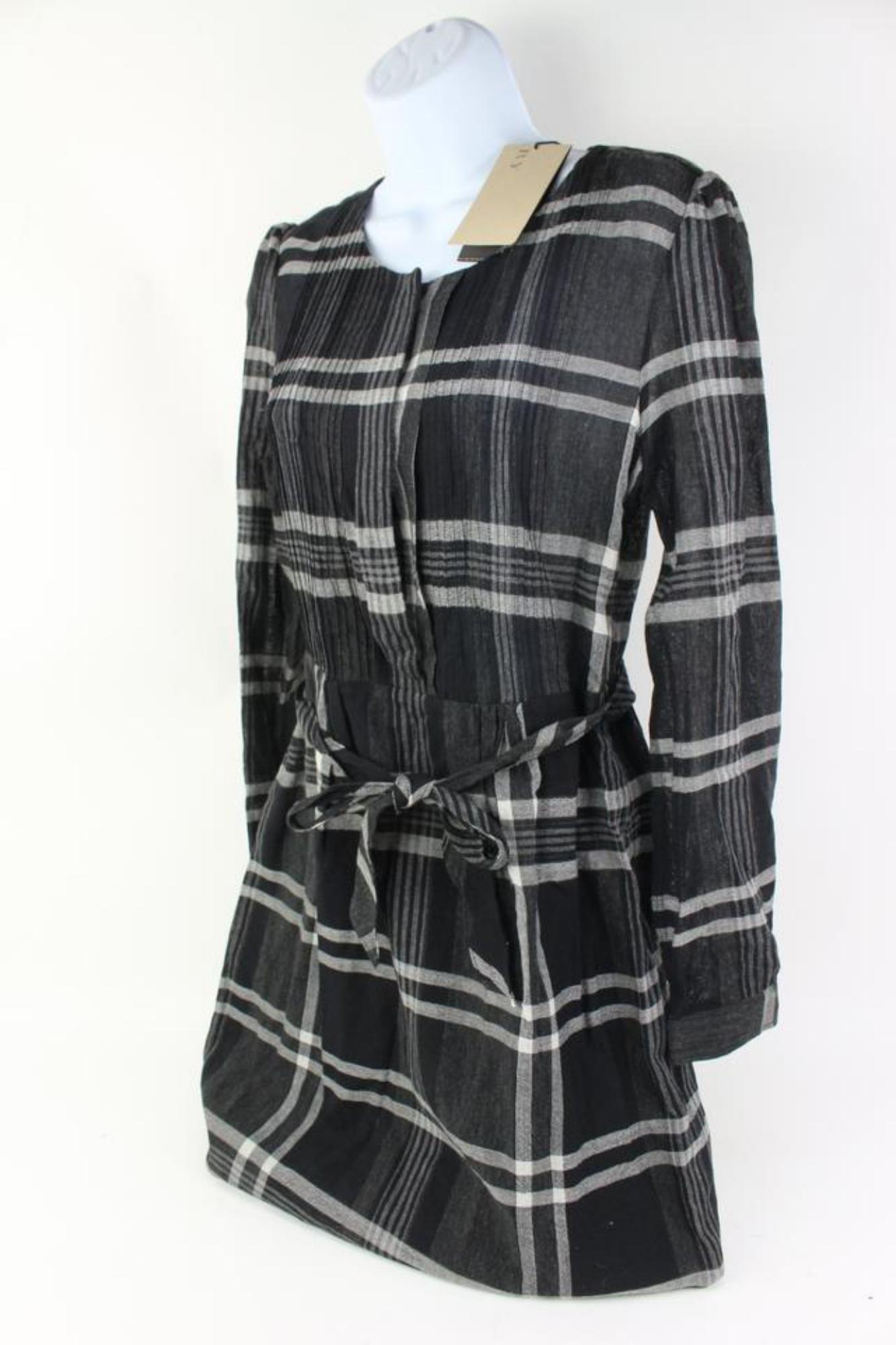 Burberry Brit Size 10 Black Nova Check Dress s331b38
Date Code/Serial Number: CNALLASIPAN 3976451/65E
Made In: China
Measurements: Length:  21
