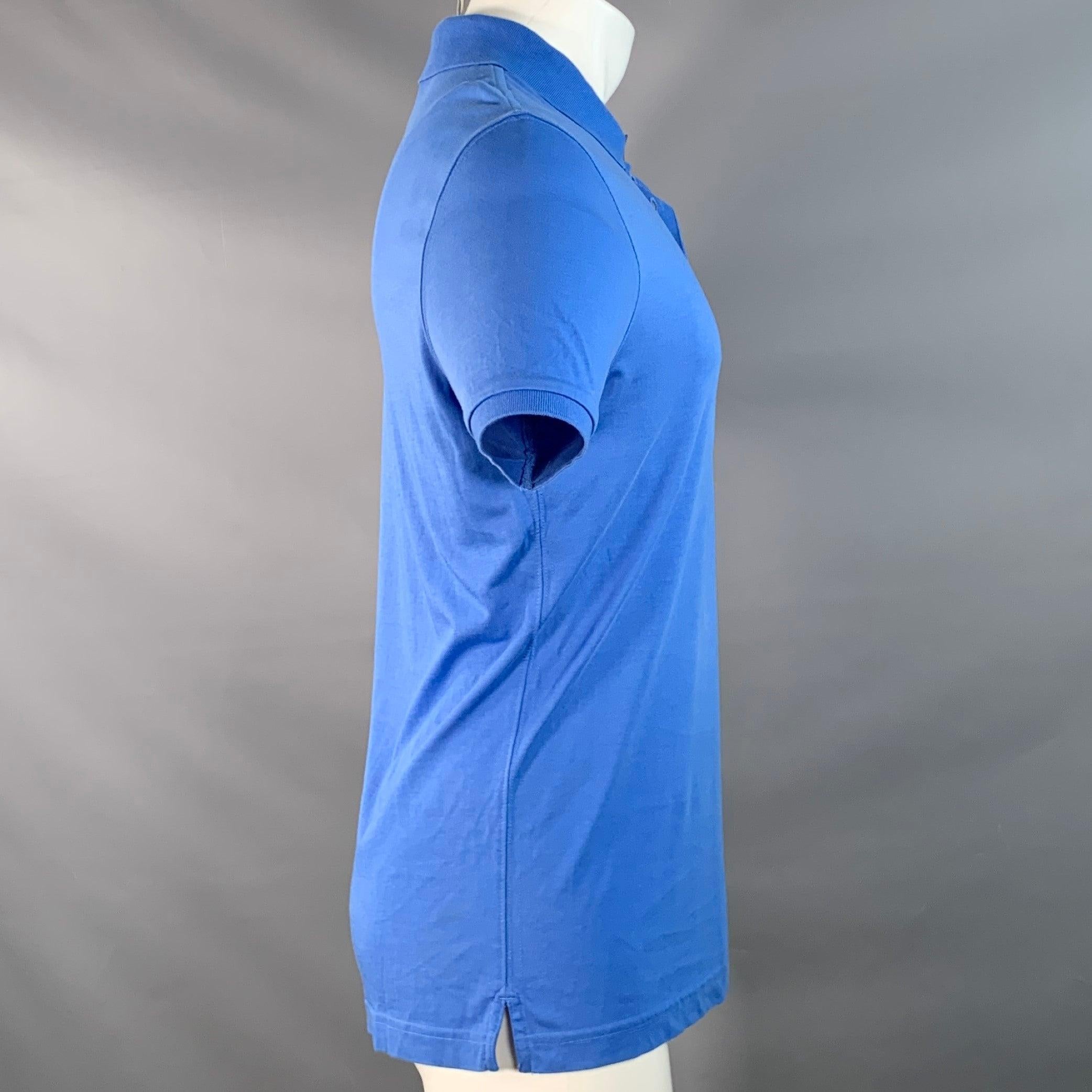 BURBERRY BRIT Talla M Polo de algodón azul con media tapeta Azul en venta