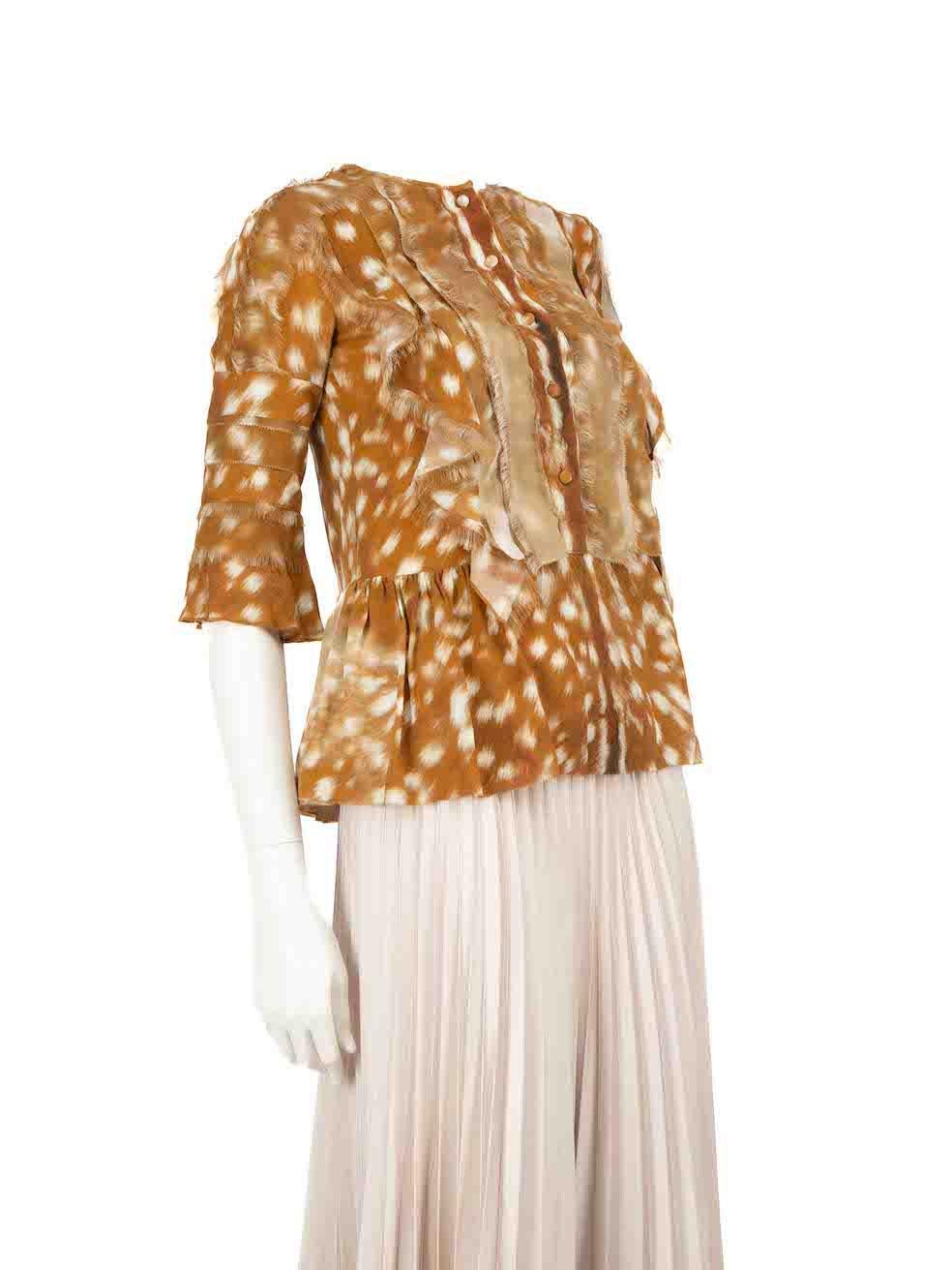 CONDITION is Very good. Minimal wear to blouse is evident. Minimal wear to the blouse is seen with a few pulls to the weave on this used Burberry designer resale item.
 
 
 
 Details
 
 
 Brown
 
 Silk
 
 Mid sleeve blouse
 
 Animal print pattern
 

