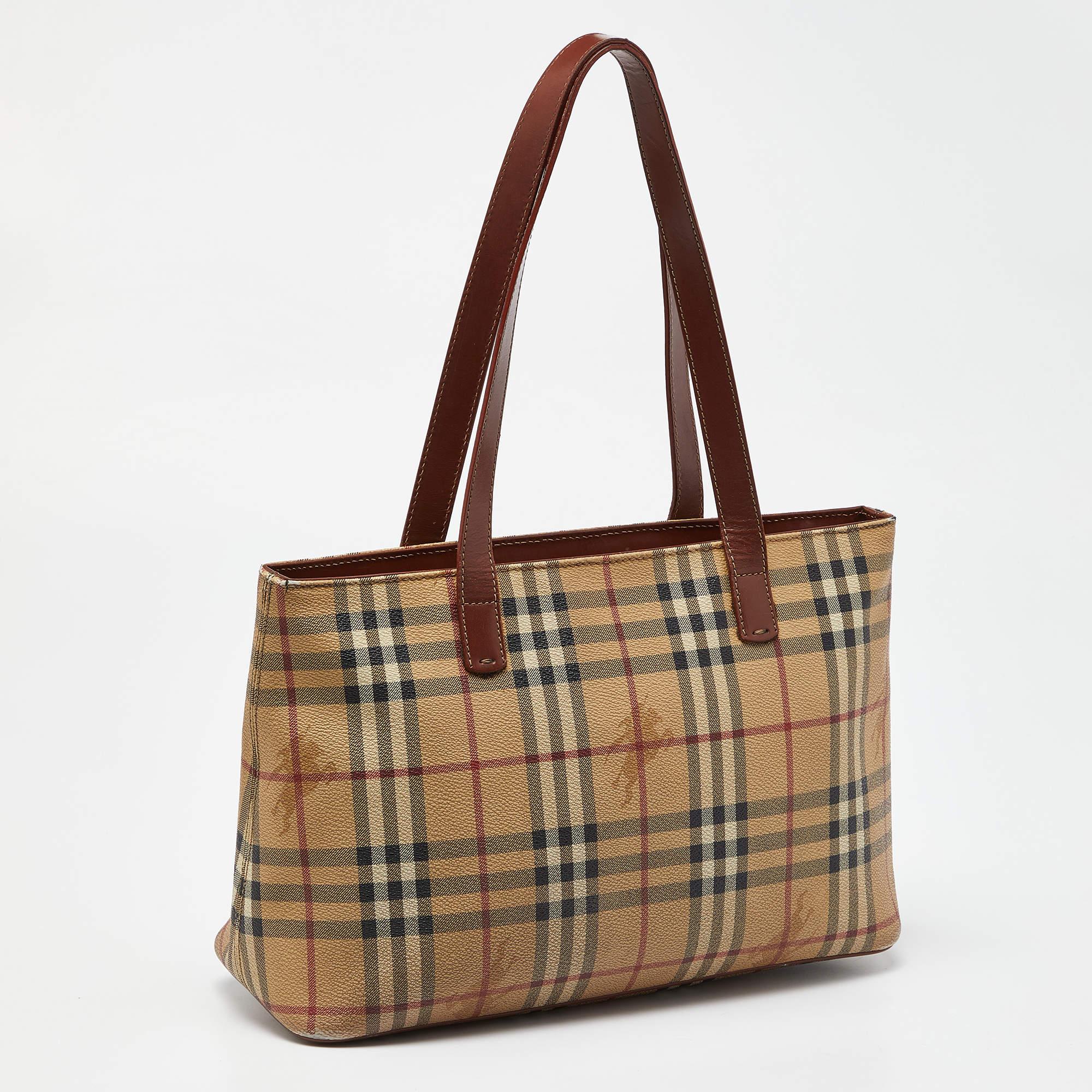 Created from high-quality materials, this tote is enriched with functional and classic elements. It can be carried around conveniently, and its interior is perfectly sized to keep your belongings with ease.

