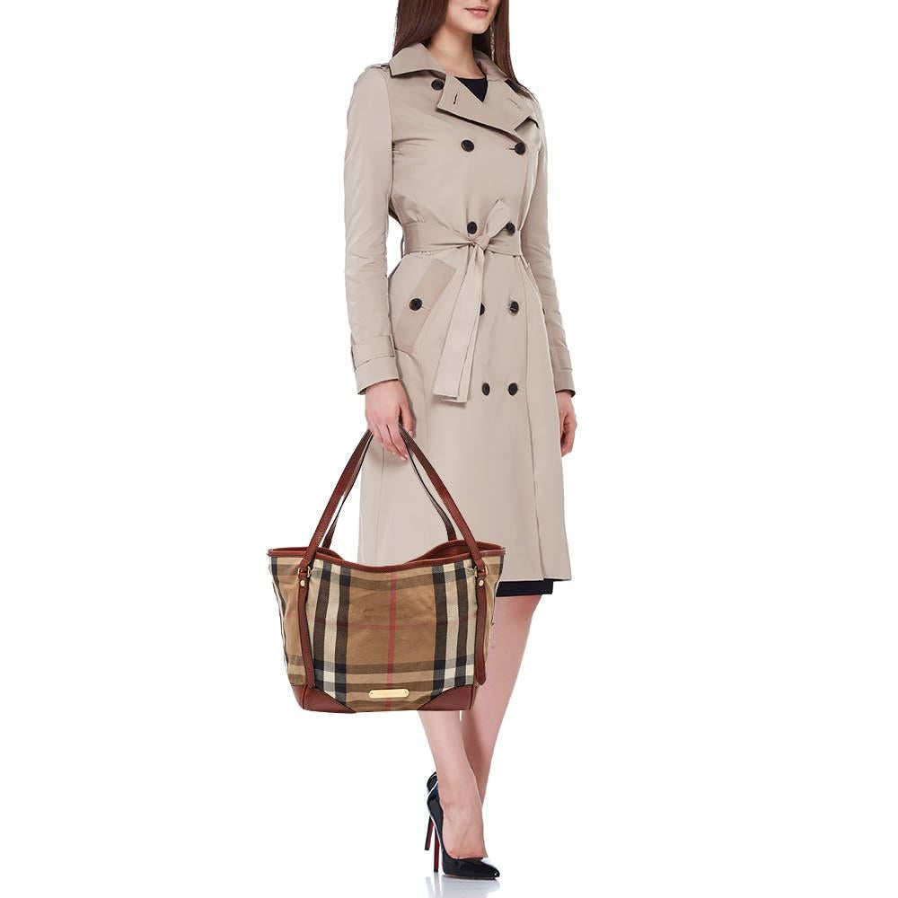 This alluring tote bag for women has been designed to assist you on any day. Convenient to carry and fashionably designed the tote is cut with skill and sewn into a great shape. It is well equipped to be a reliable accessory.