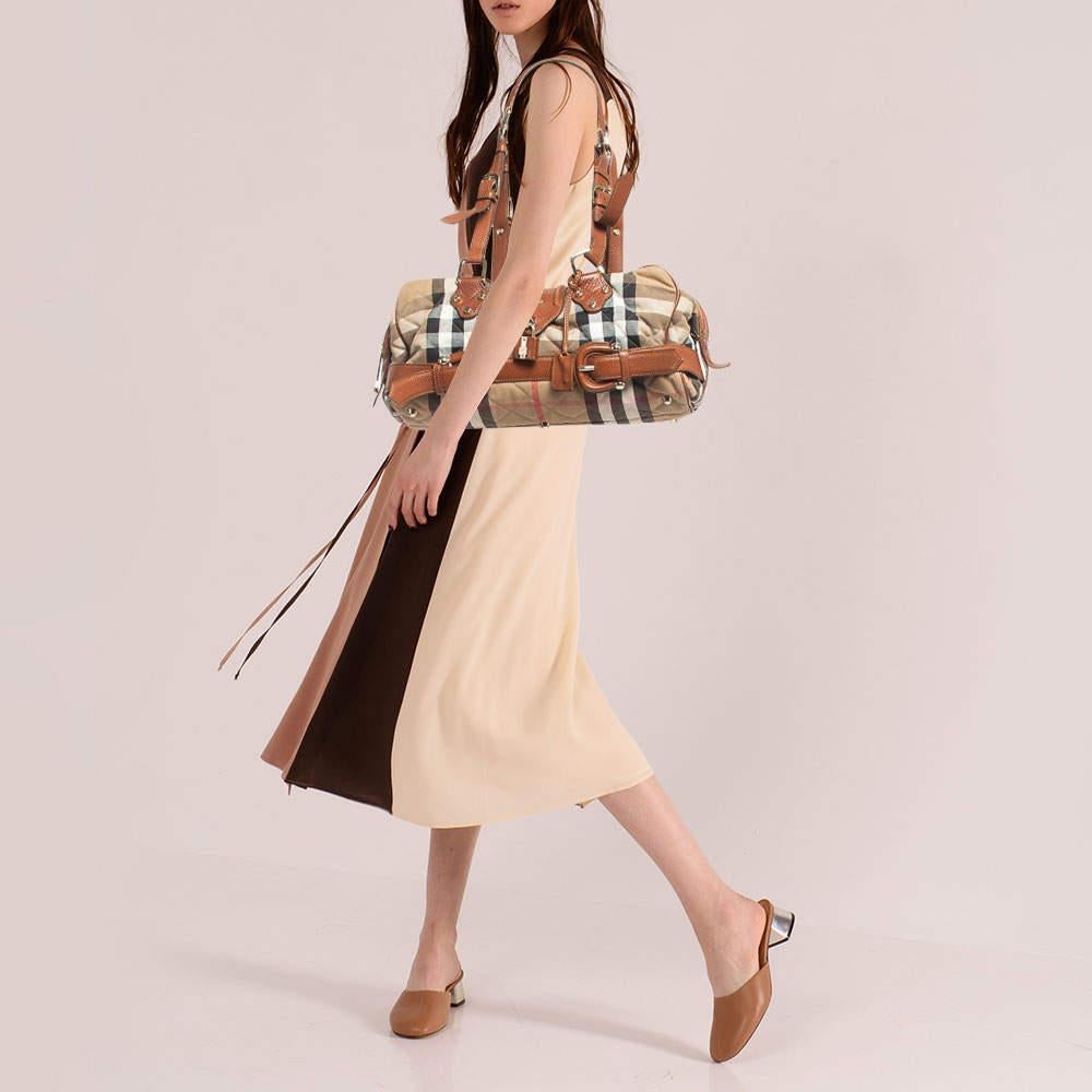 This satchel is built to hold your essentials in the most fashionable way! Easy to style, well-made using best materials, and coming from the top brand, the satchel will add immense style to your ensemble.

