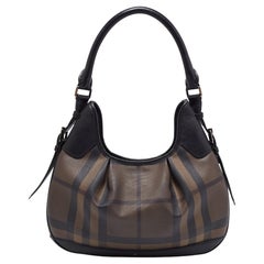 Borsa Brooklyn piccola in PVC e pelle Nova Check marrone/nera di Burberry