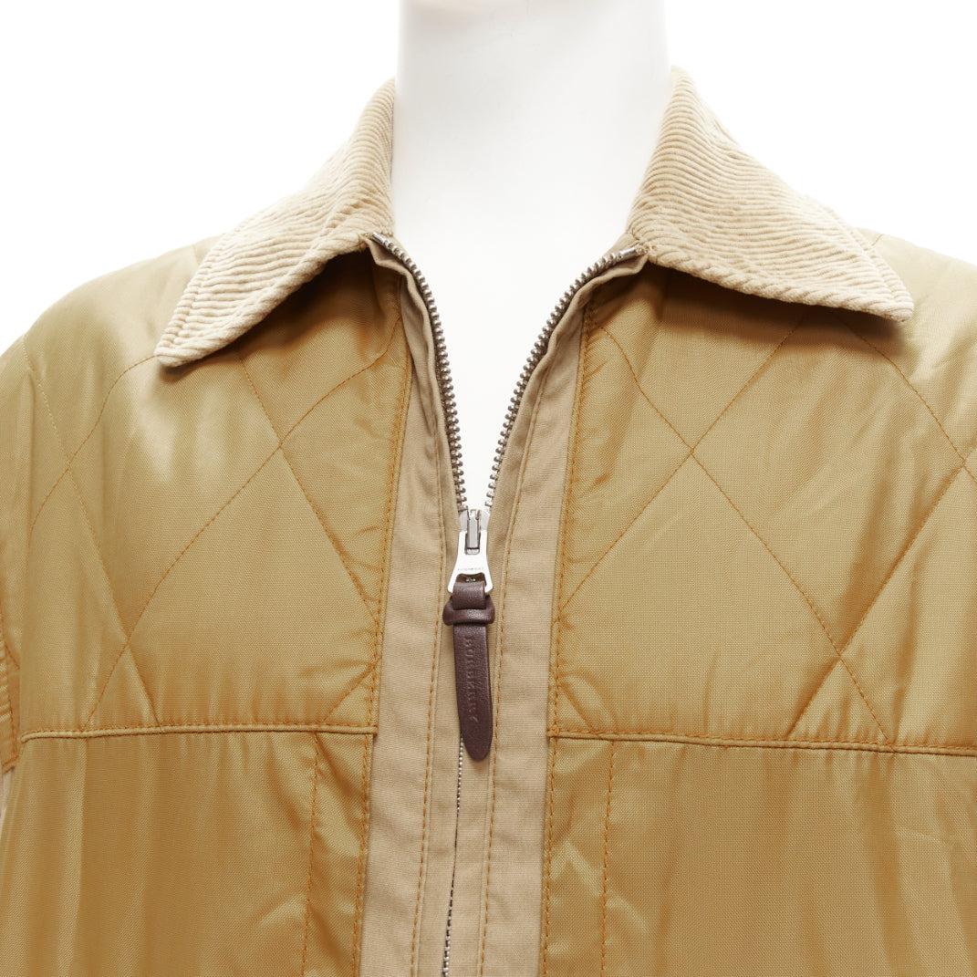BURBERRY brown corduroy collar padded pocketed chore field jacket M
Reference: KNCN/A00053
Brand: Burberry
Designer: Christopher Bailey
Material: Polyester, Cotton
Color: Brown
Pattern: Solid
Closure: Zip
Lining: Khaki Fabric
Made in: