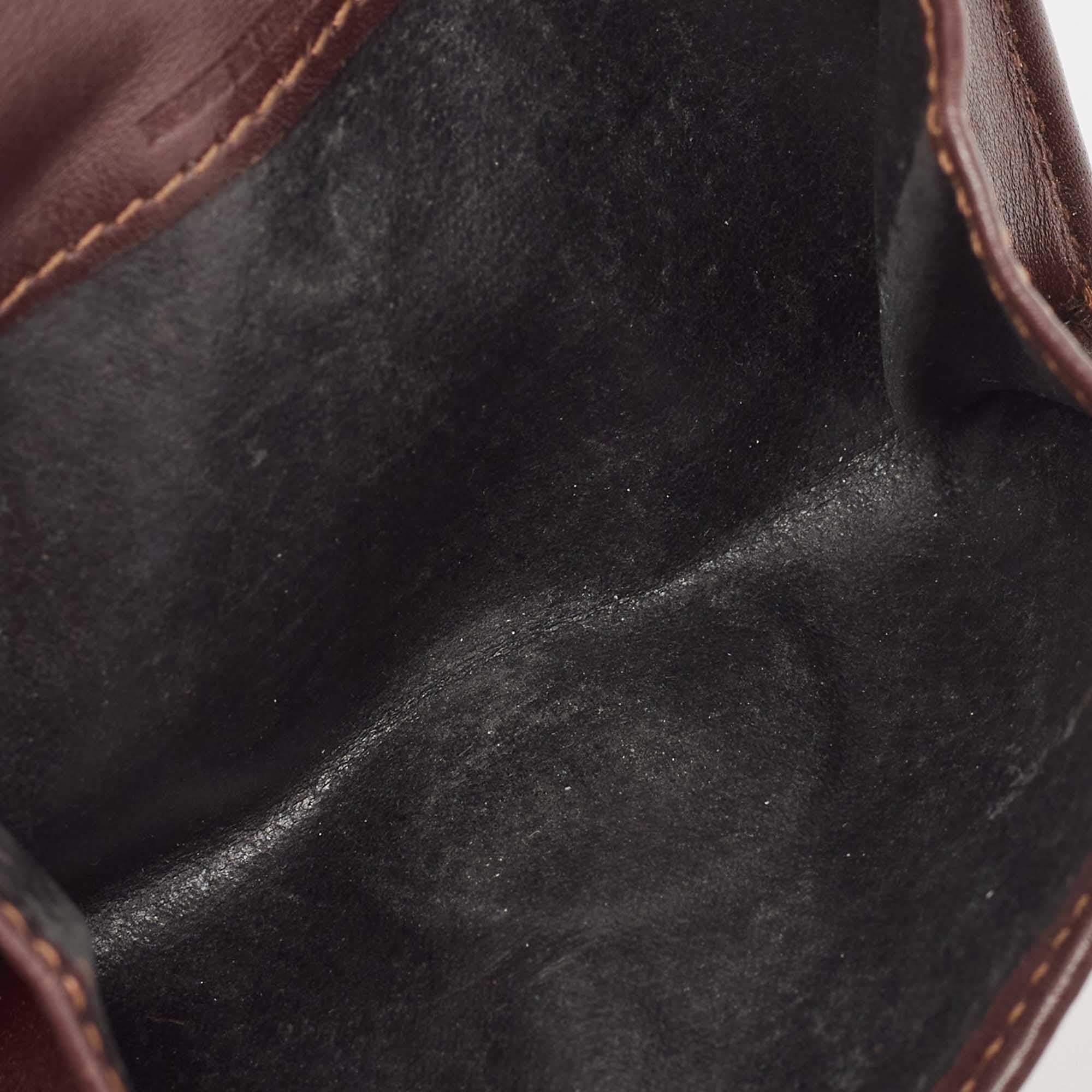 Burberry Portafoglio compatto con fibbia in pelle Haymarket Check Coates Marrone In condizioni discrete in vendita a Dubai, Al Qouz 2