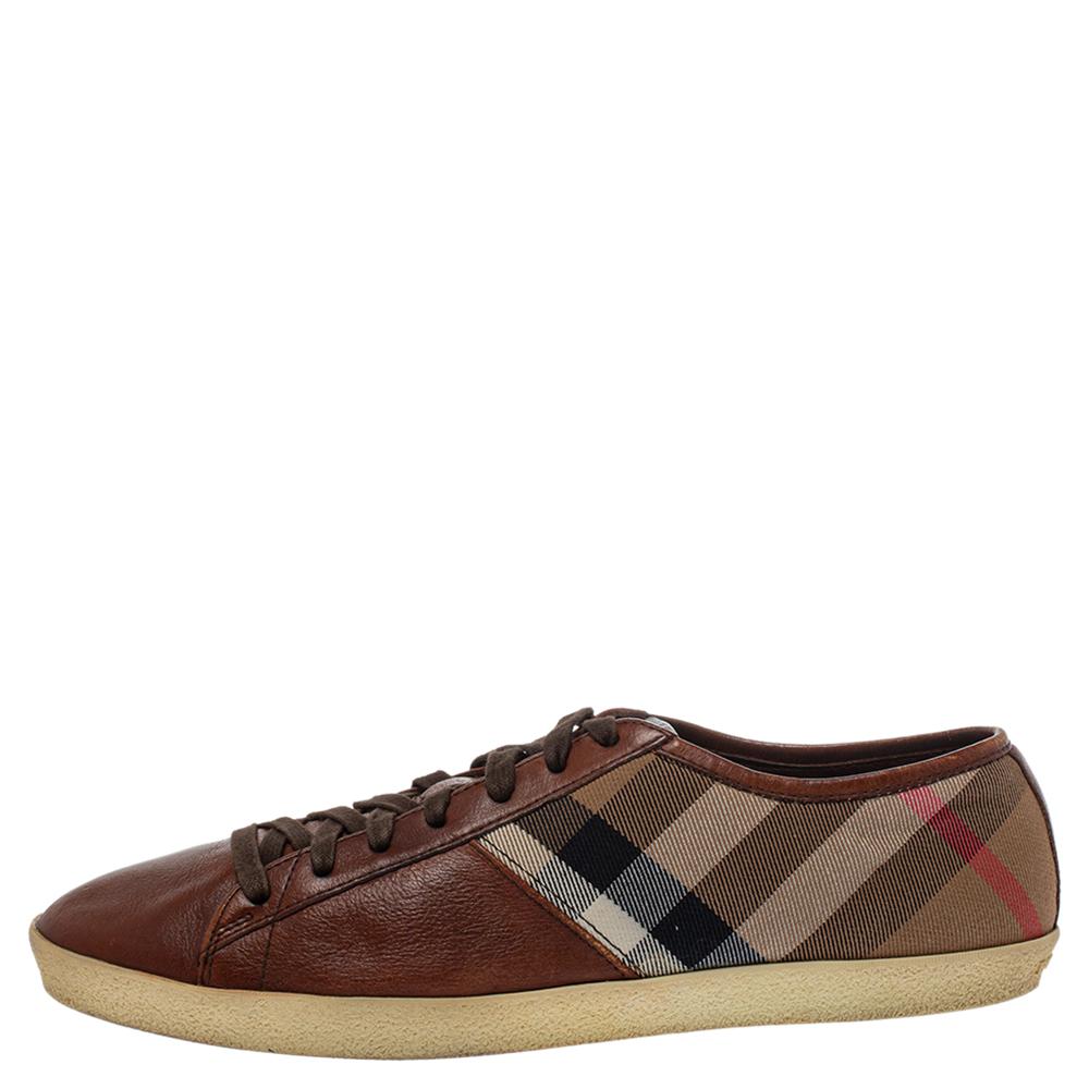 These low-top sneakers from Burberry are meant for sneaker lovers like you! They have been crafted from brown leather and the signature Nova Check canvas and designed with round toes, lace-ups on the vamps, and brand labels on the tongues. They are