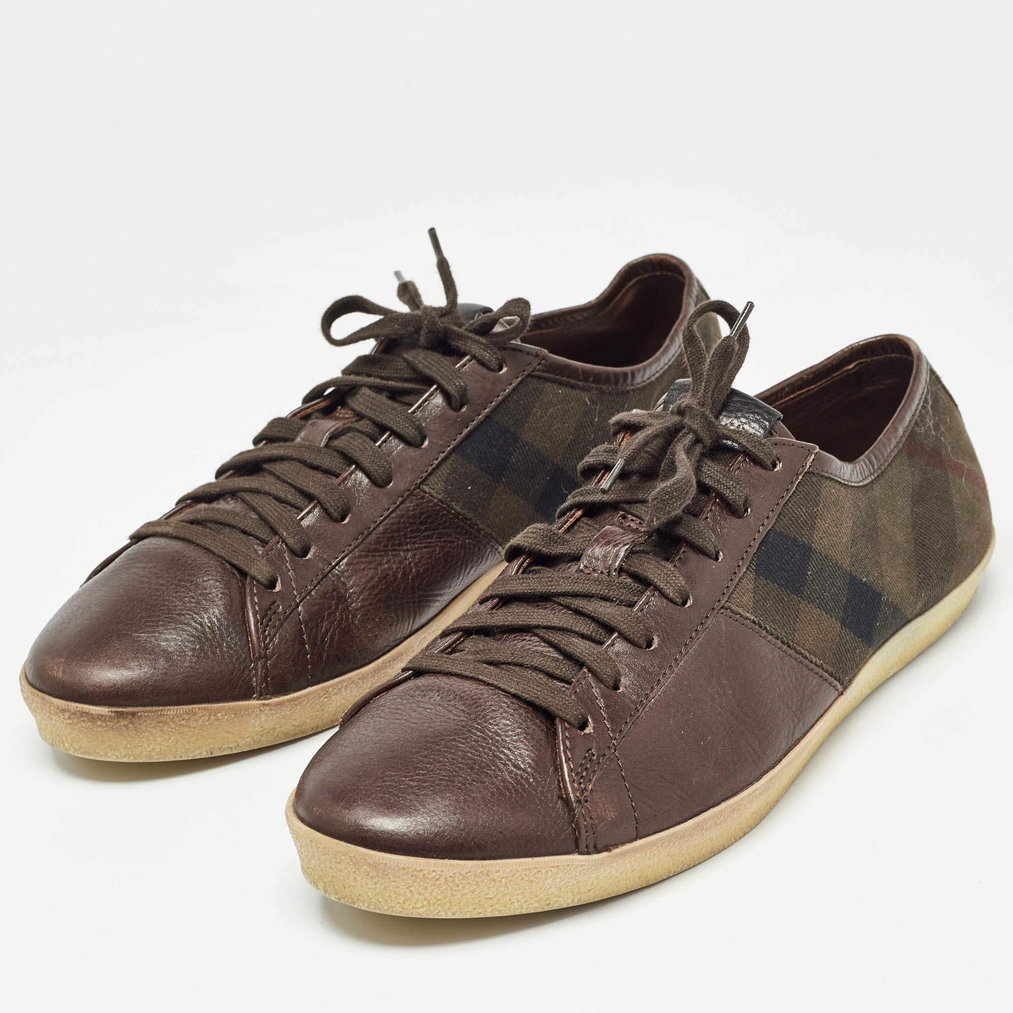 Coming in a classic silhouette these designer sneakers are a seamless combination of luxury comfort and style. These sneakers are finished with signature details and comfortable insoles.