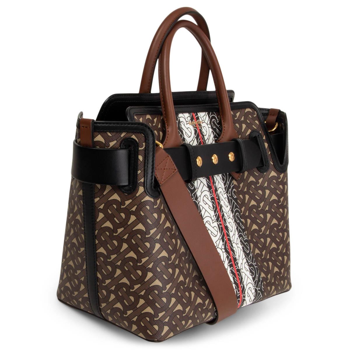 100% authentic Burberry 'Small Belted' tote in brown Monogram Stripe e-canvas with brown and black leather details. Adjustable and removable shoulder strap. Lined in black leather with two magnetic snap pockets. Has been carried and is in virtually
