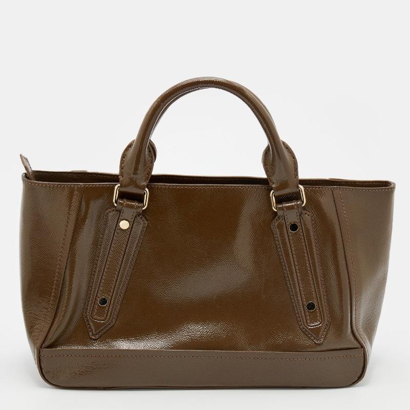 Burberry brings us this classy tote that has been crafted from patent leather. It has a brown hue, a spacious fabric interior capable of carrying your essentials with ease, and a brand signature on the front. The piece comes equipped with protective