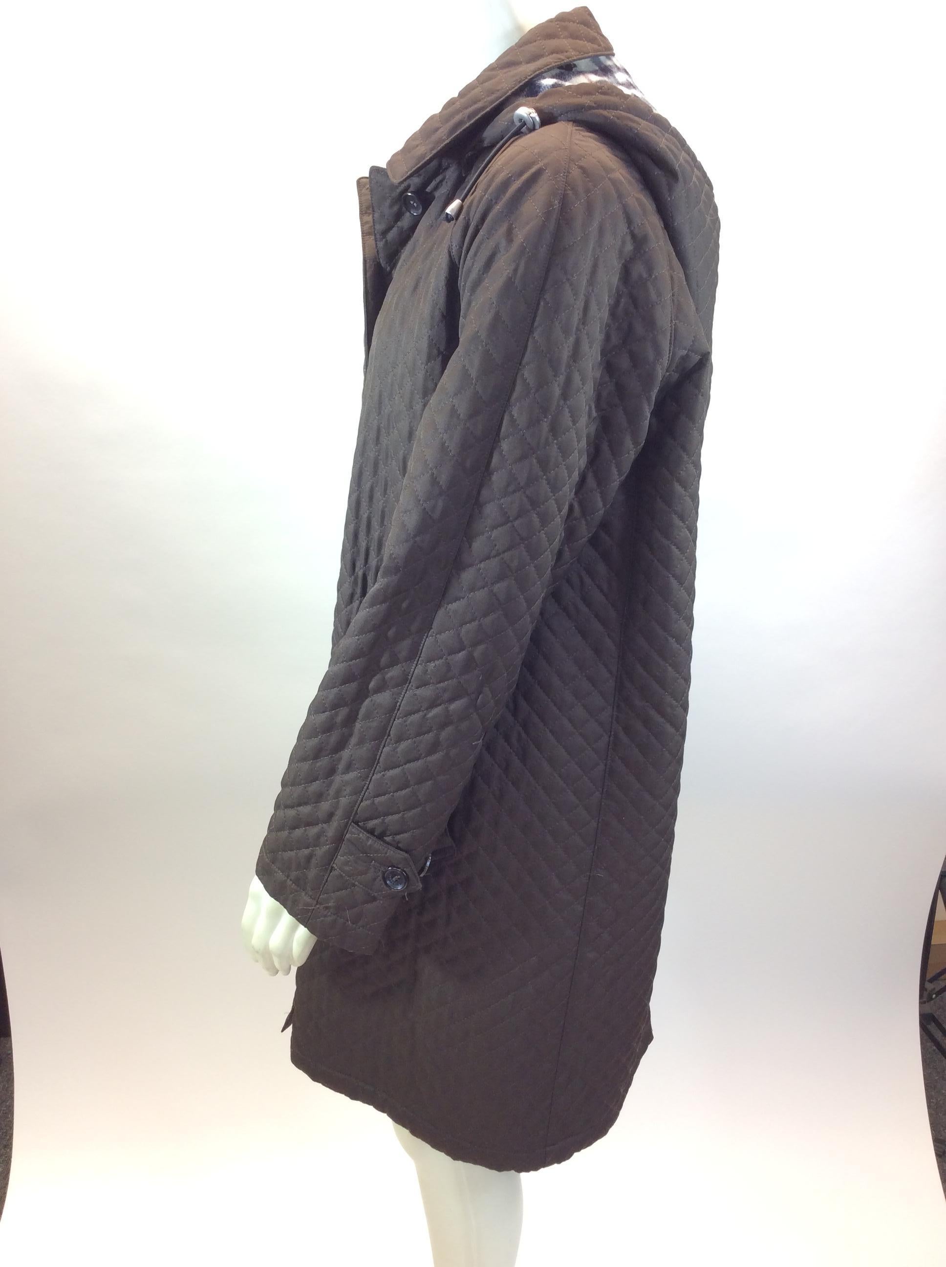 Burberry Brown Quilted Coat
$299
Made in the US
100% Polyester
Size 8
Length 34
