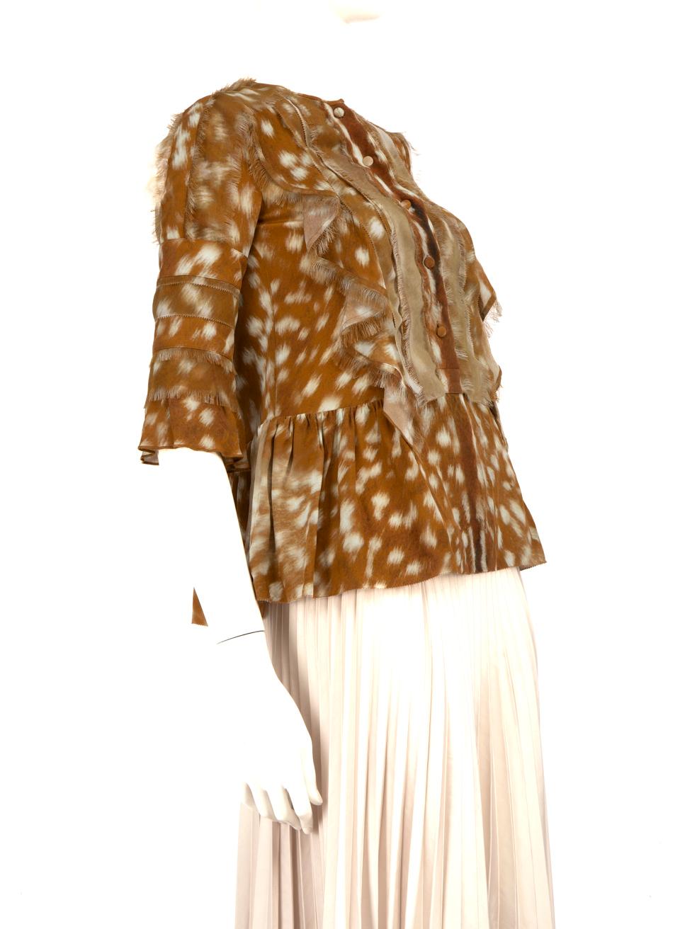 CONDITION is Very good. Hardly any visible wear to top is evident on this used Burberry designer resale item. Sizing label reads children's age 10.
  
  
  
  Details
  
  
  Brown
  
  Silk
  
  Blouse
  
  Deer print
  
  Long sleeves
  
  Raw hem
