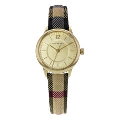 Burberry Montre pour femme BU10201 à cadran miel en acier inoxydable et quartz de couleur or