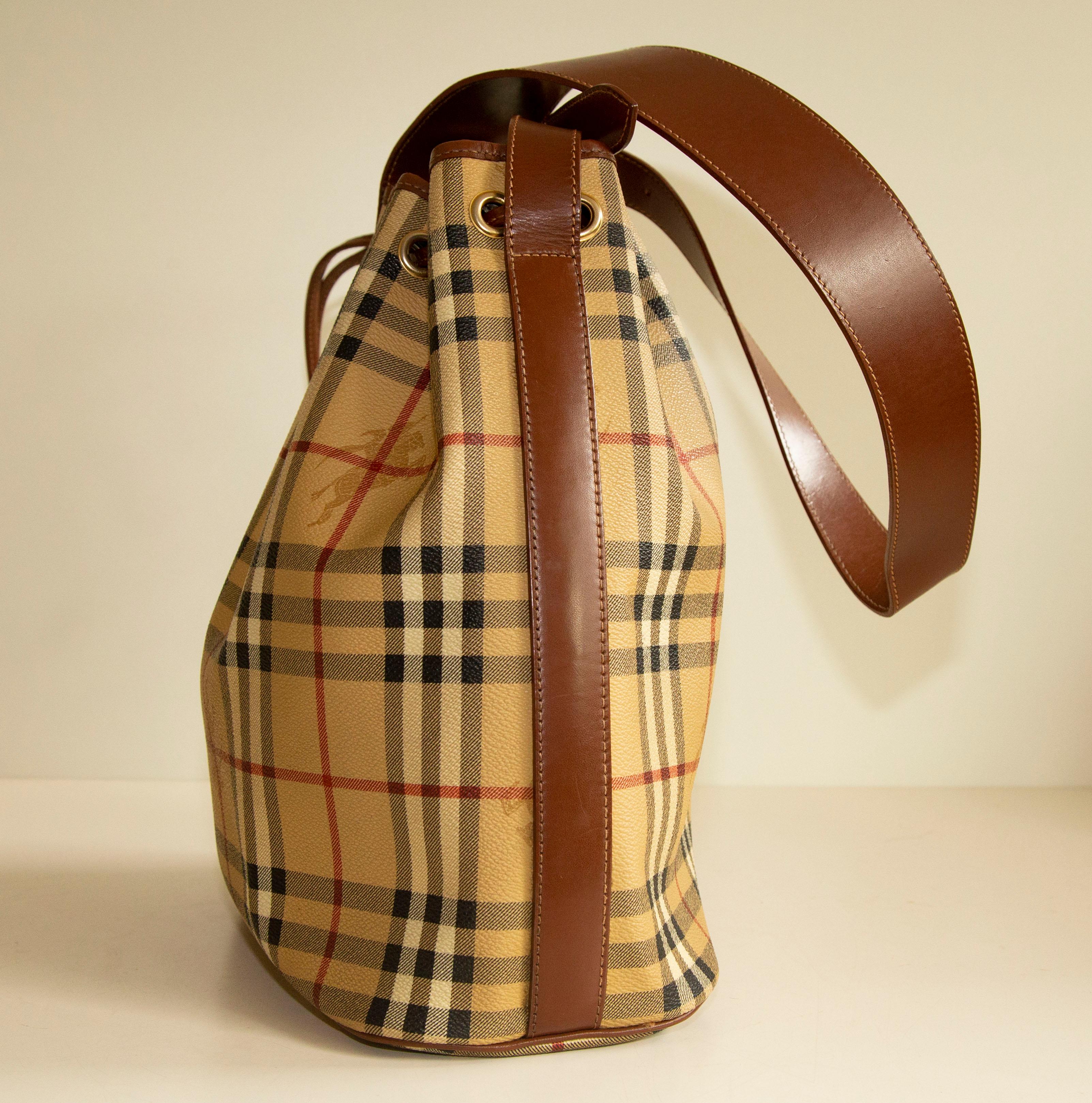 Burberry Bucket Bag in Classic Check Vinyl Coated Canvas  1